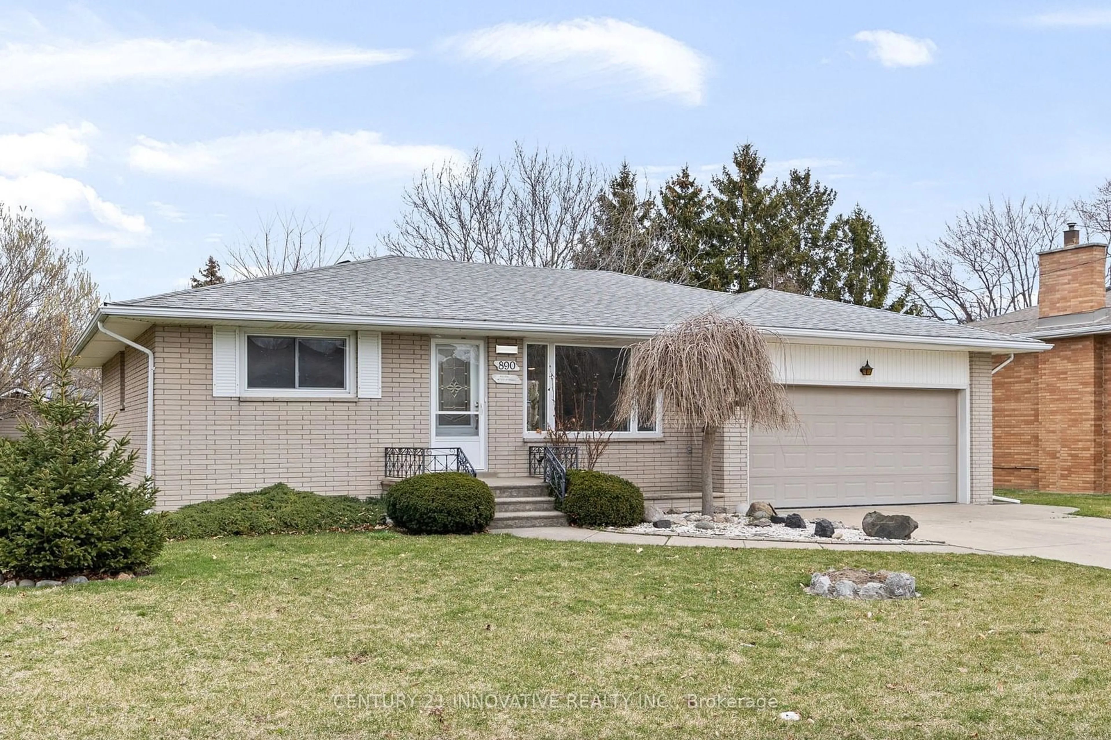 Frontside or backside of a home, the street view for 890 Wallace Ave, Windsor Ontario N9G 1M3