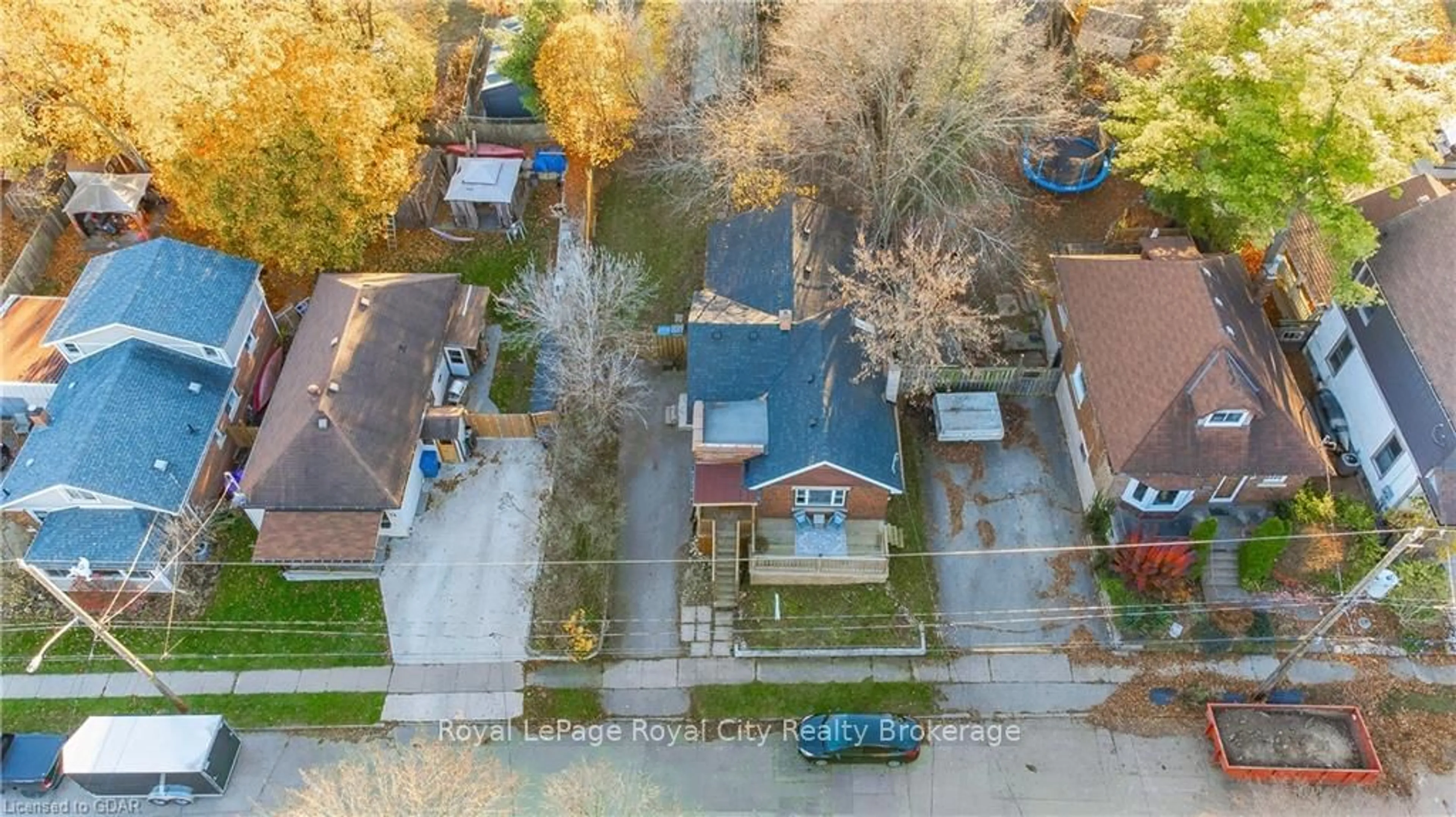 A pic from exterior of the house or condo, the fenced backyard for 67 HAYES Ave, Guelph Ontario N1E 5V7