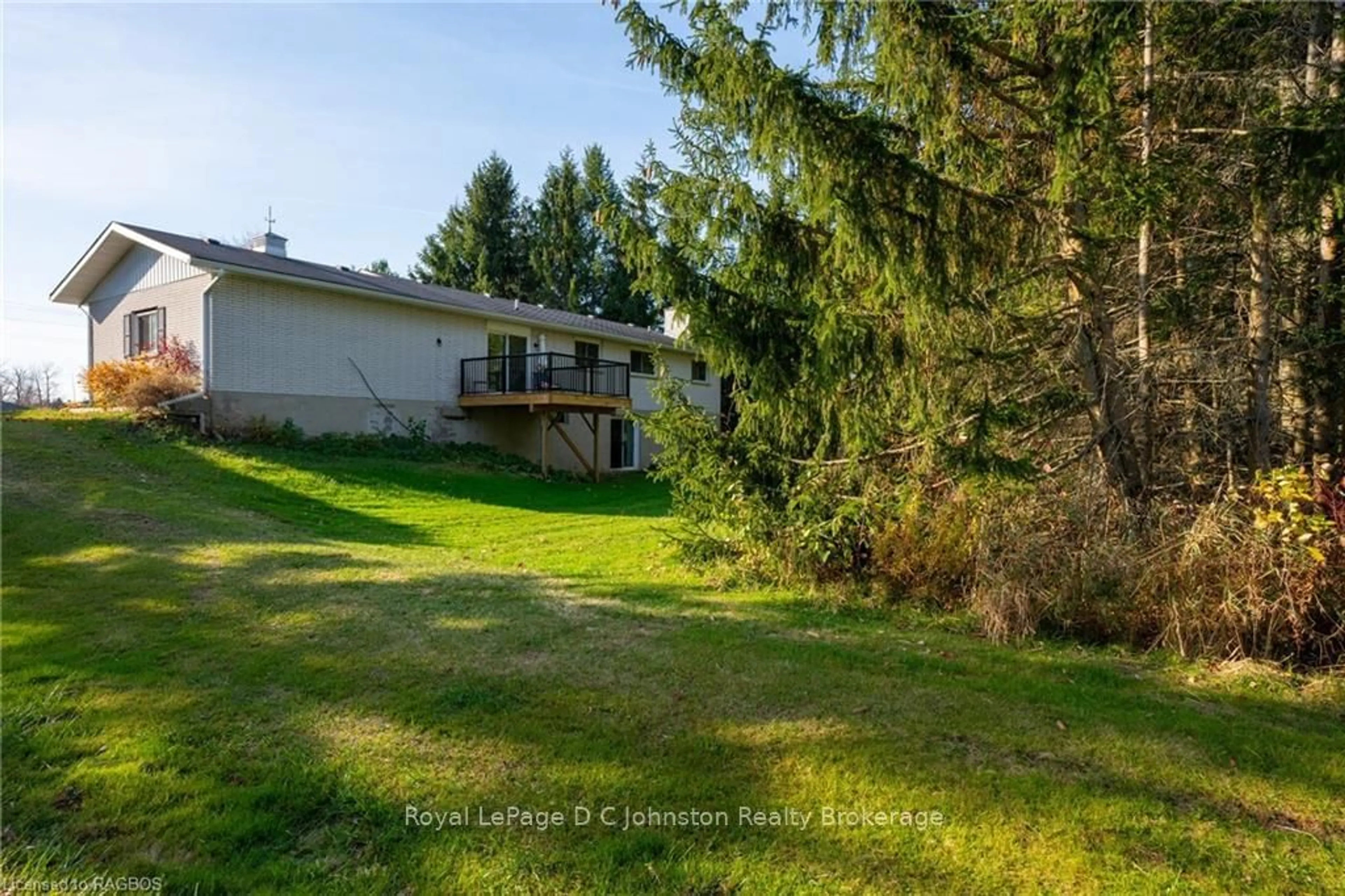 Frontside or backside of a home, the fenced backyard for 7199 HIGHWAY 21, South Bruce Peninsula Ontario N0H 1A0