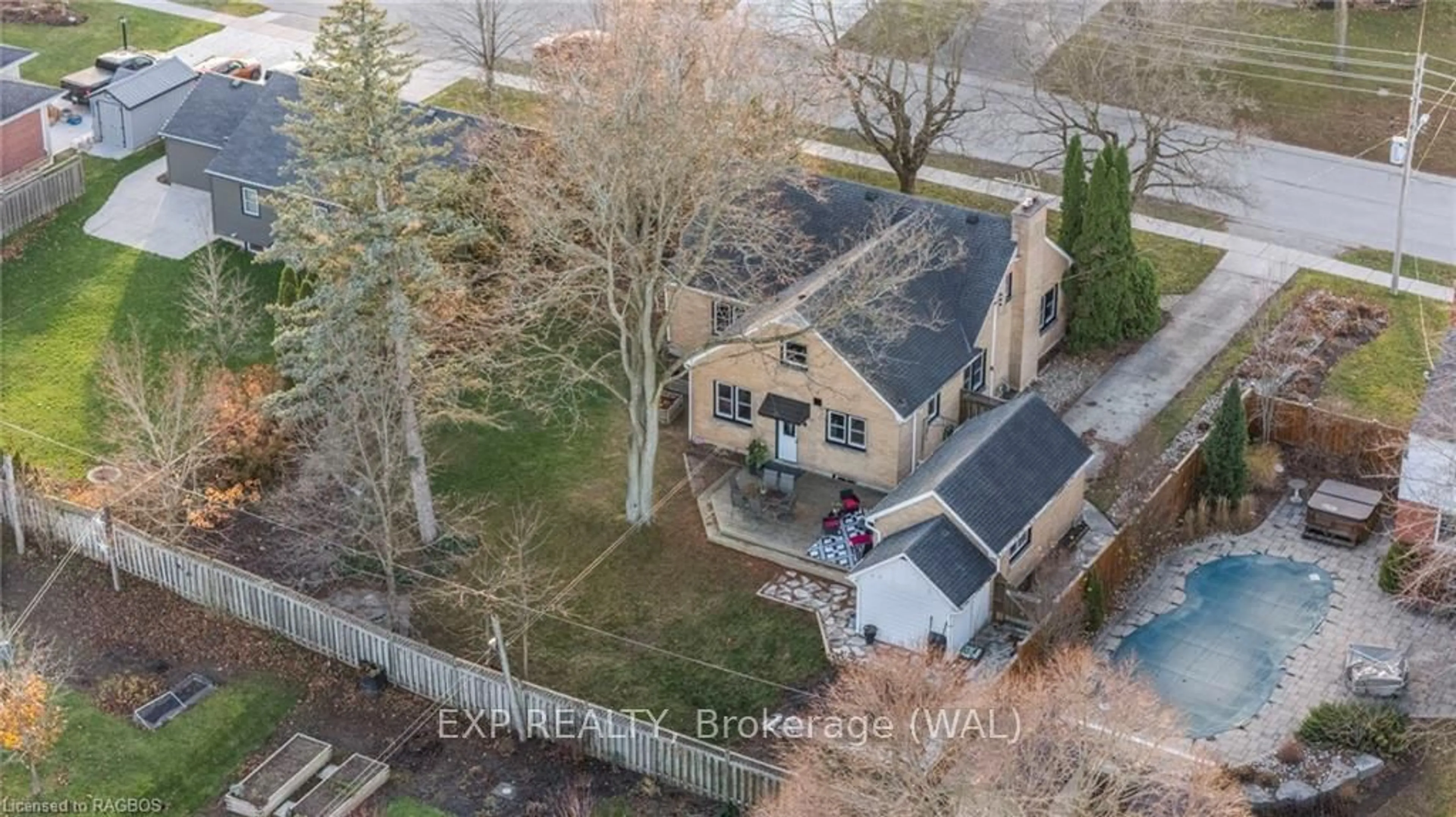 Frontside or backside of a home, the fenced backyard for 108 HINKS St, Brockton Ontario N0G 2V0