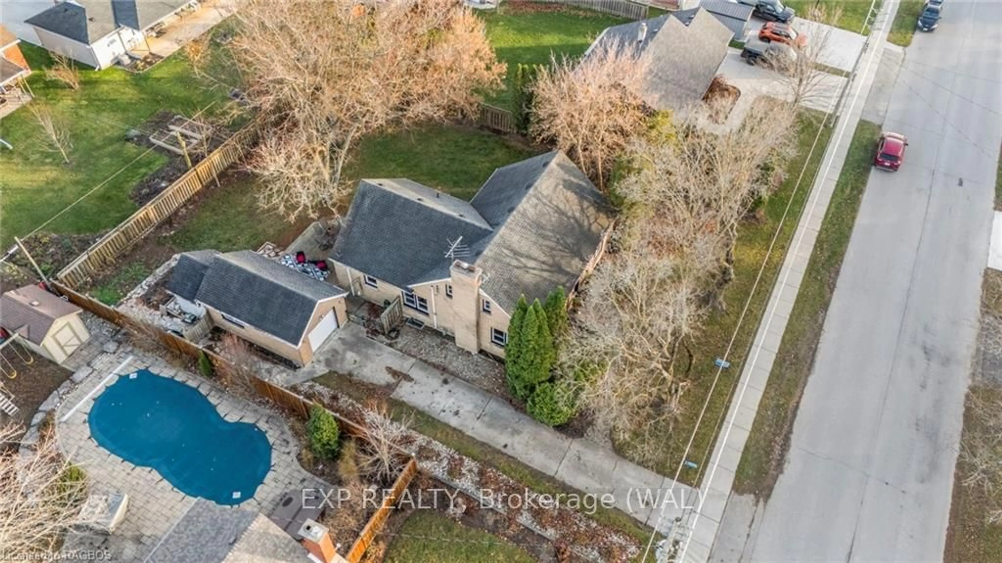 Frontside or backside of a home, the fenced backyard for 108 HINKS St, Brockton Ontario N0G 2V0