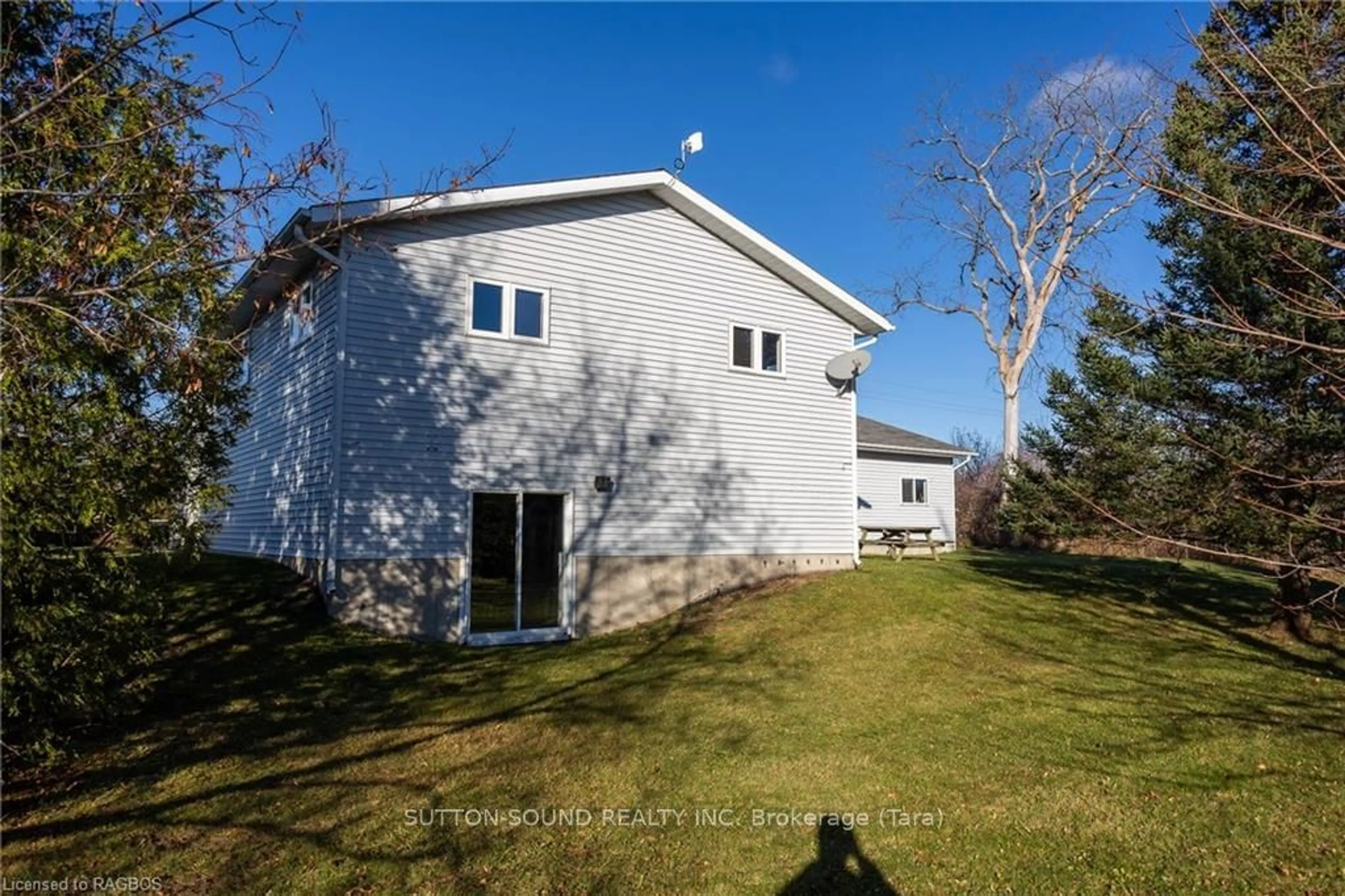 Frontside or backside of a home, the fenced backyard for 401142 GREY RD 17, Georgian Bluffs Ontario N0H 2T0