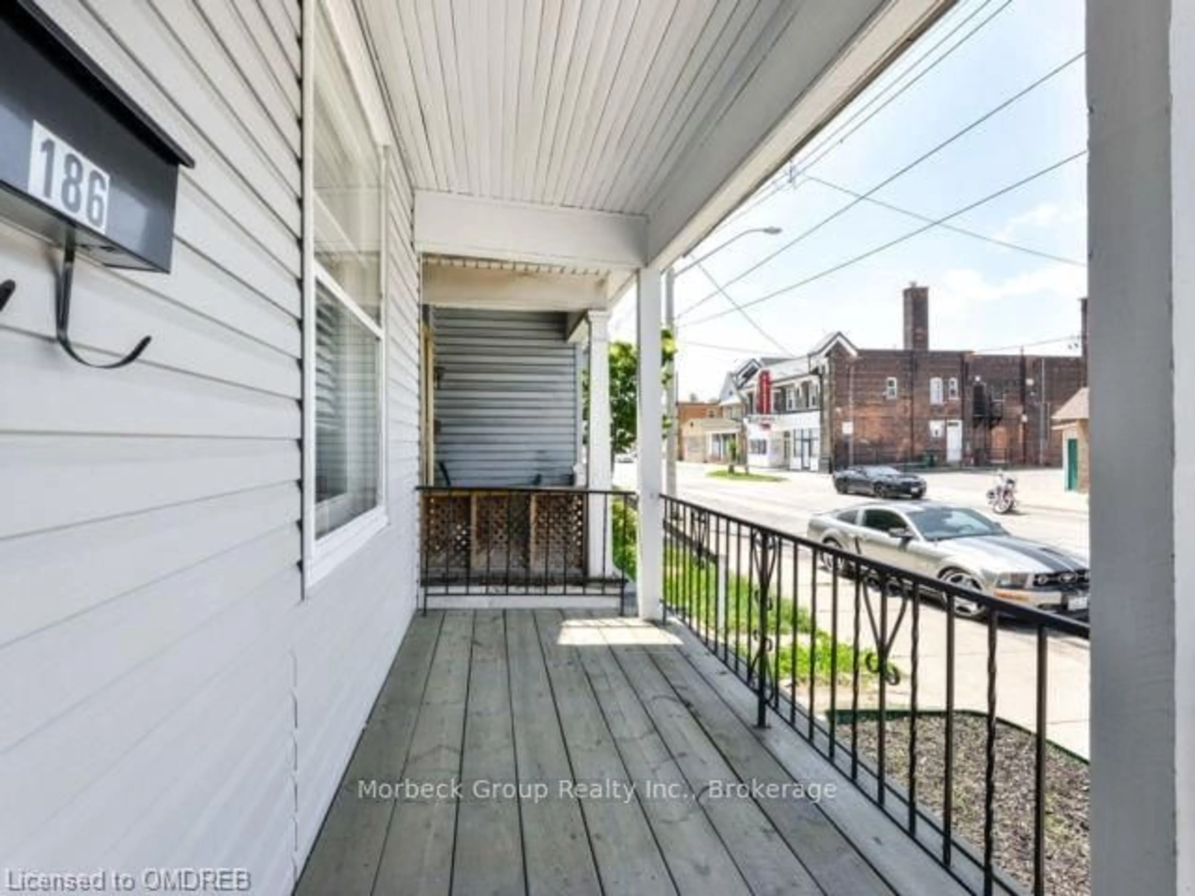 A pic from exterior of the house or condo, the fenced backyard for 186 SHERMAN Ave, Hamilton Ontario L8L 6M9