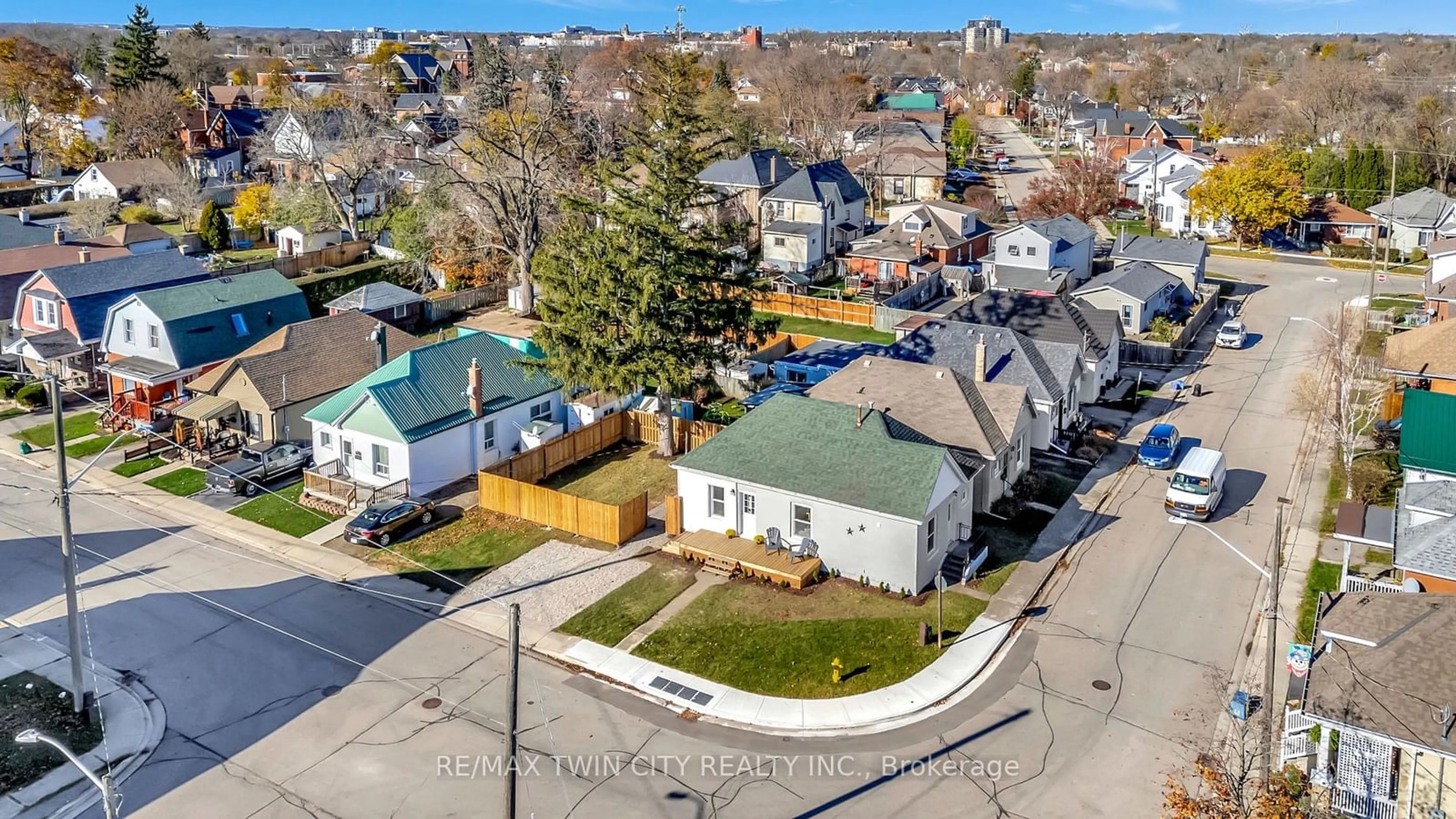 Frontside or backside of a home, the fenced backyard for 15 Gordon St, Brantford Ontario N3S 2M7