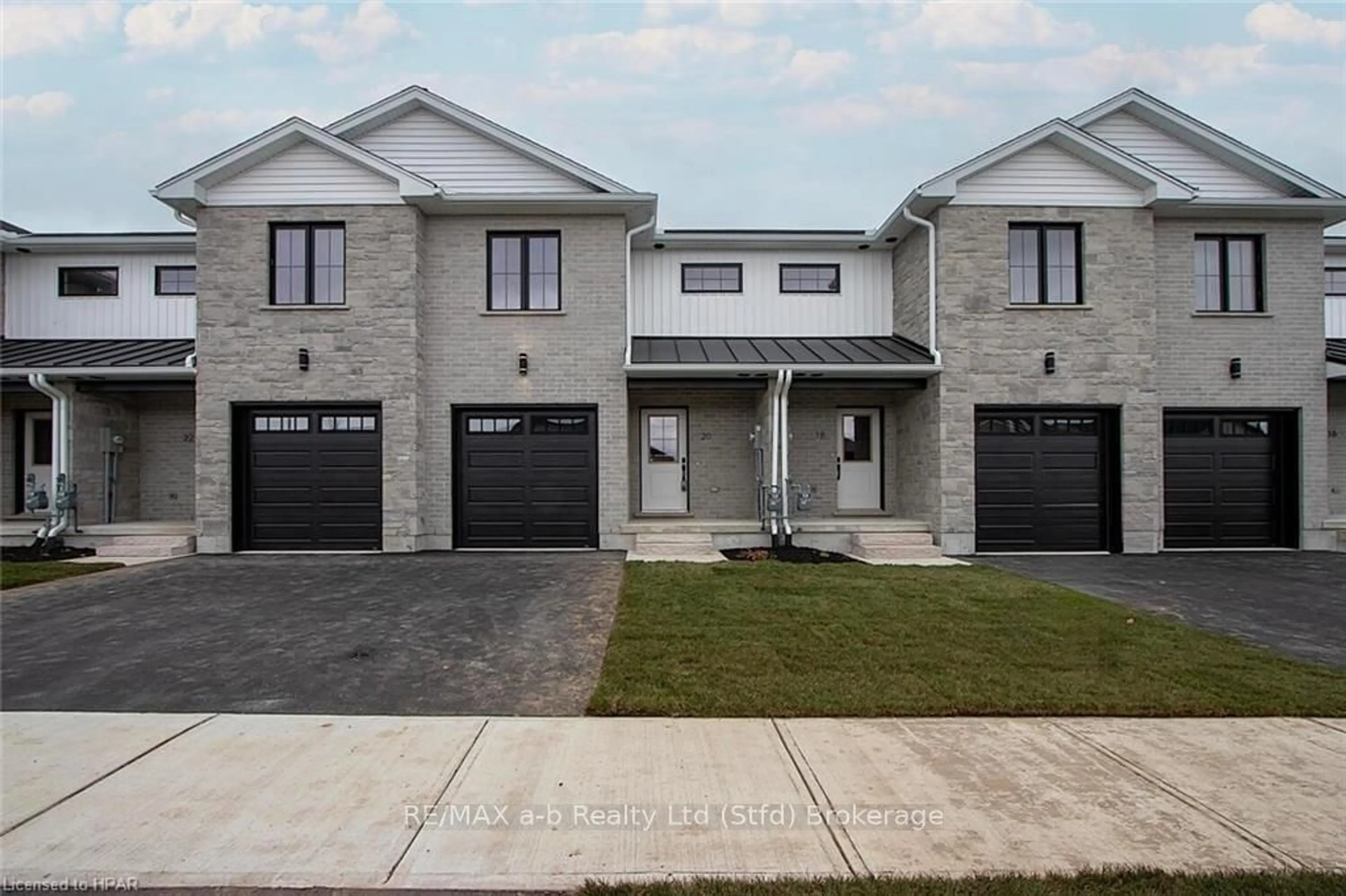 Frontside or backside of a home, the street view for 18 LINDA Dr, Huron East Ontario N0K 1W0