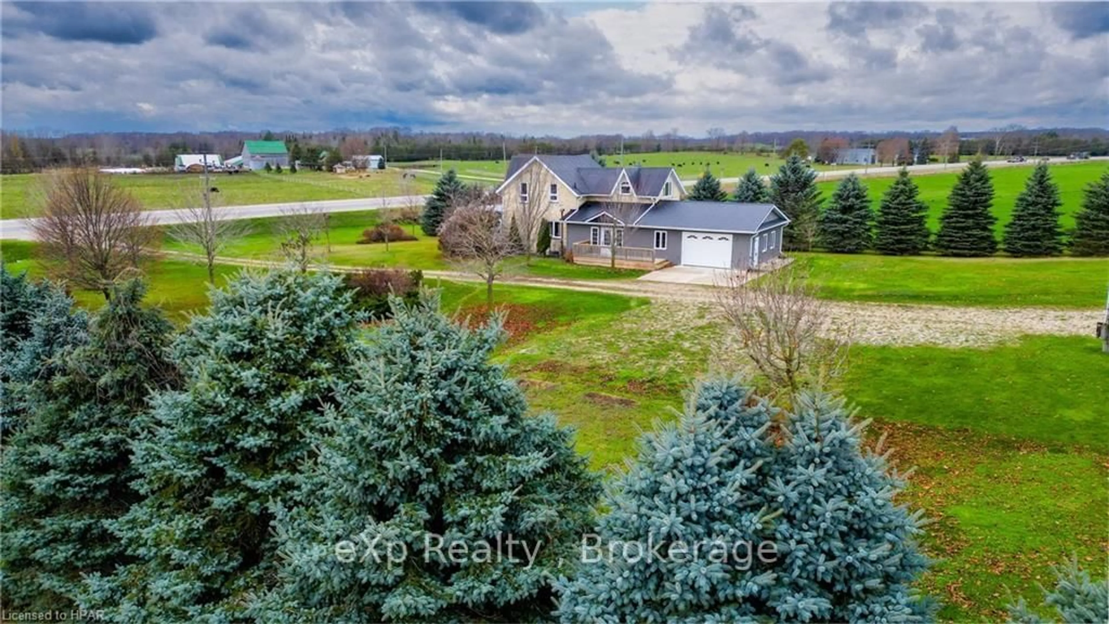 A pic from exterior of the house or condo, the fenced backyard for 311371 HWY 6, Southgate Ontario N0G 2L0