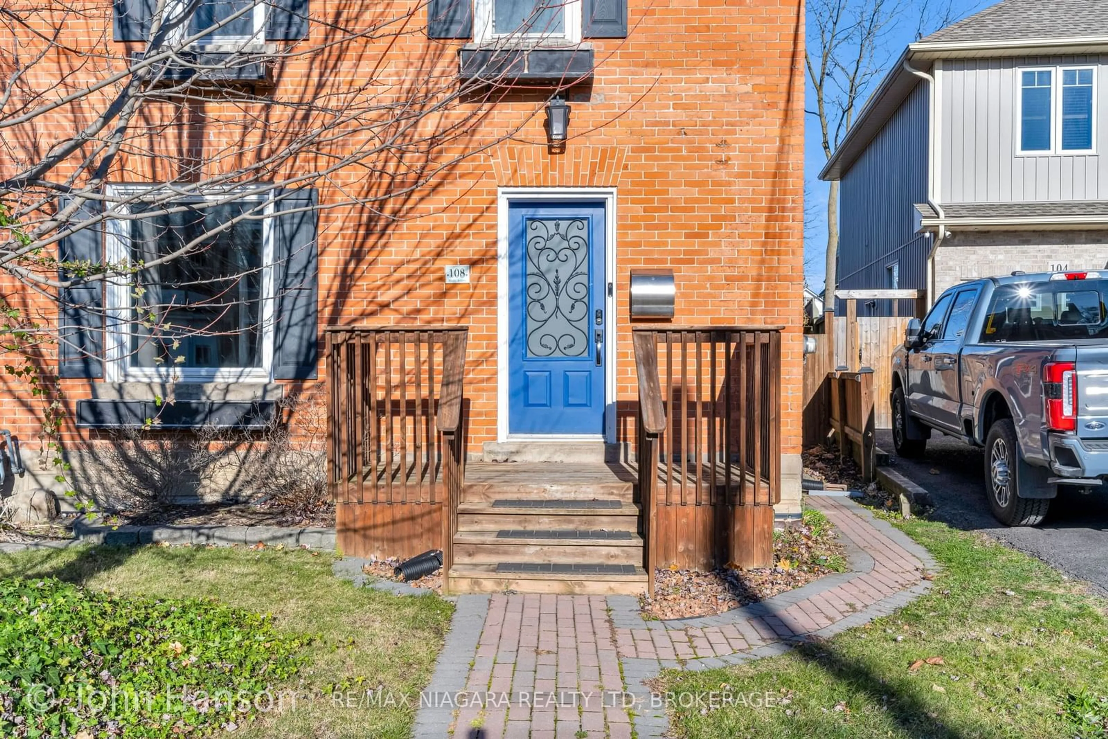 A pic from exterior of the house or condo, the fenced backyard for 108 Maple Ave, Welland Ontario L3K 5G6