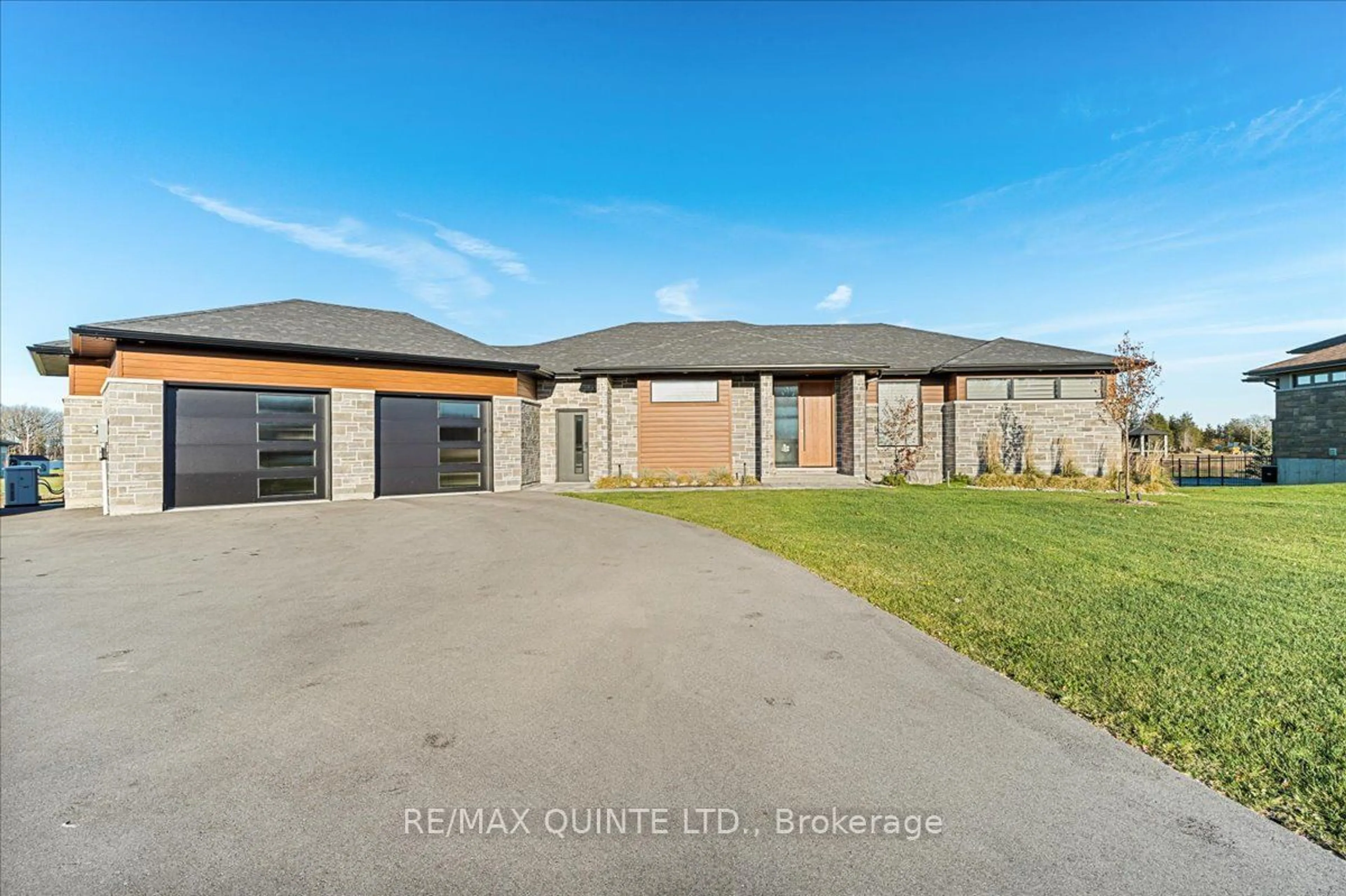 Frontside or backside of a home, the front or back of building for 656 County Road 28, Prince Edward County Ontario K8N 0G2