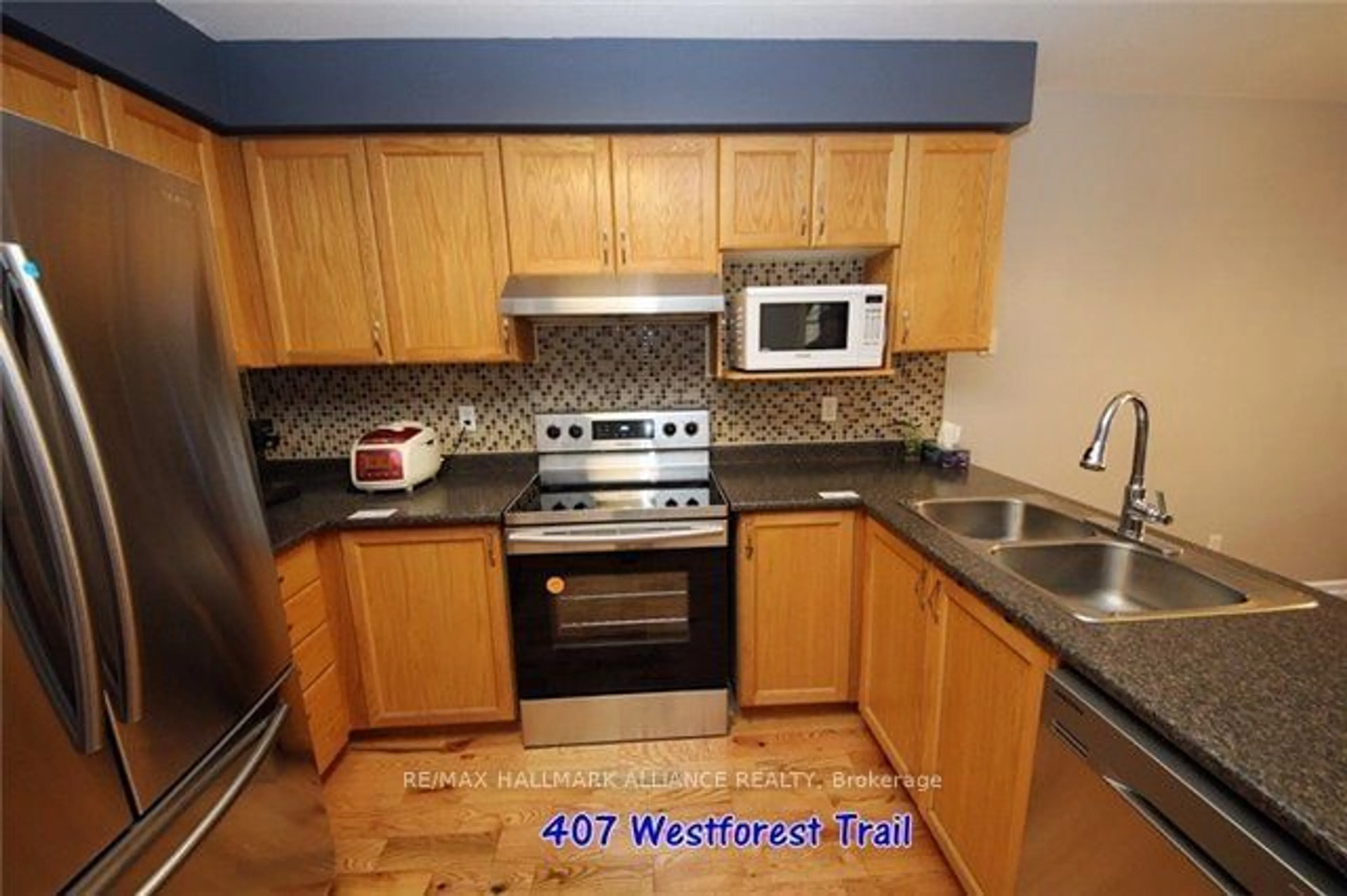 Standard kitchen, wood floors, cottage for 407 Westforest Tr, Kitchener Ontario N2N 3L8