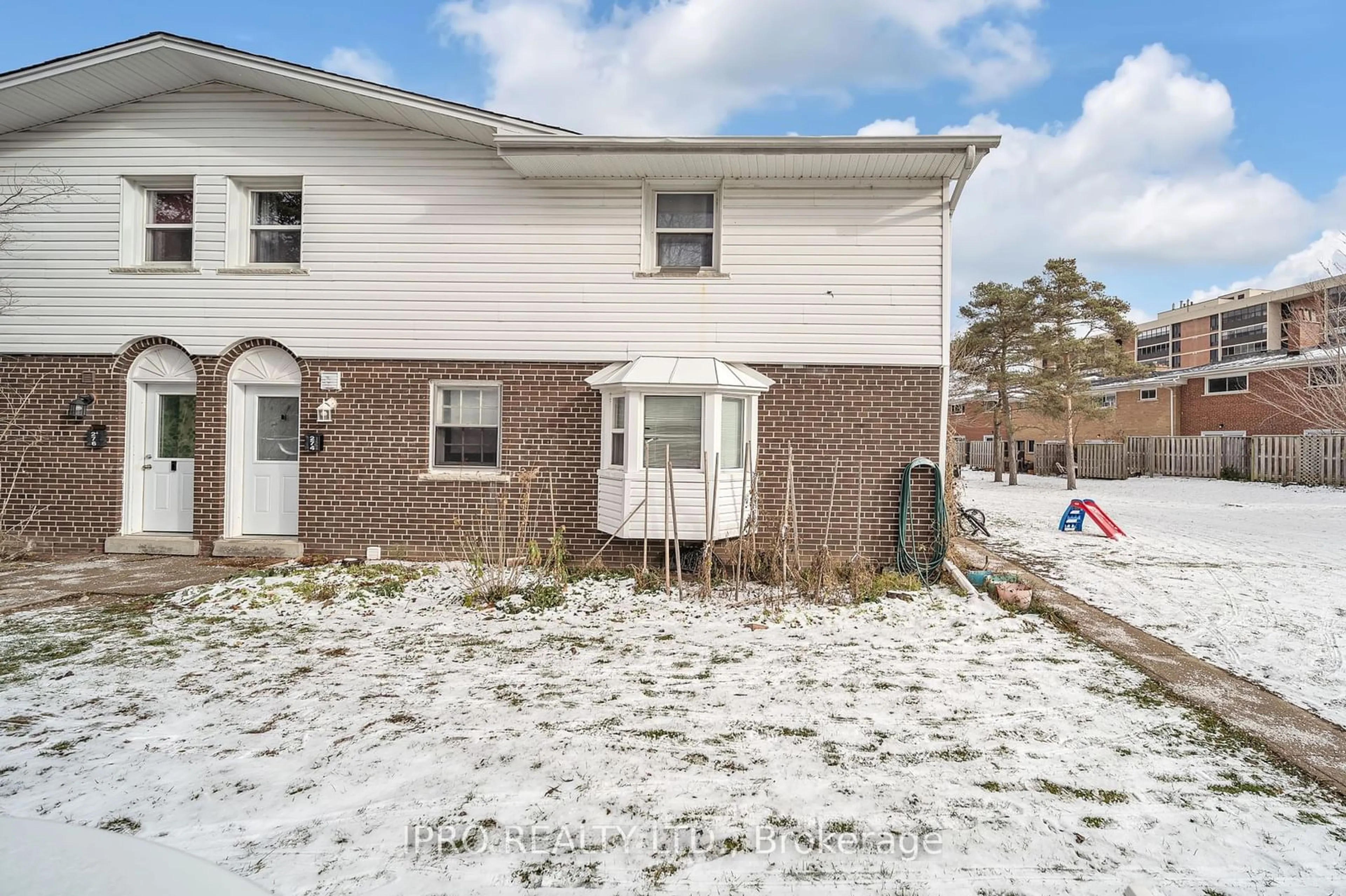 A pic from exterior of the house or condo, the fenced backyard for 272 Westcourt Pl, Waterloo Ontario N2L 2R7