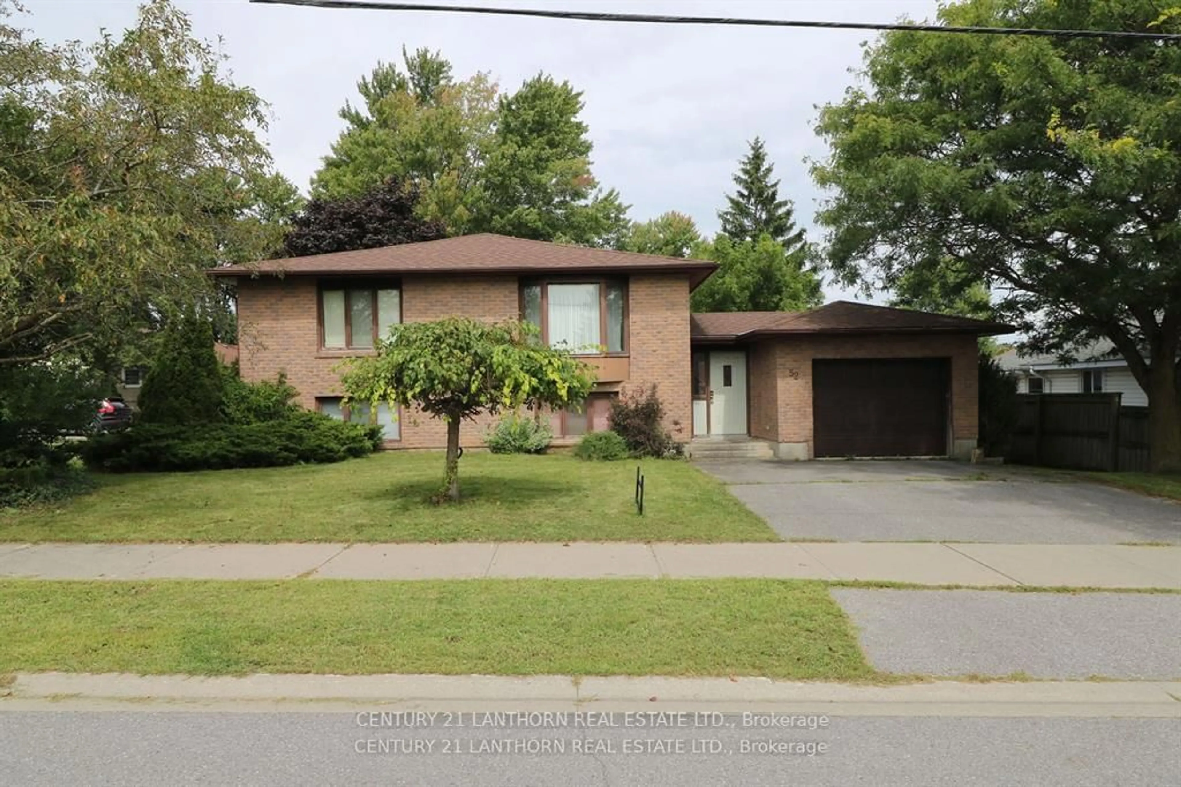 Frontside or backside of a home, the street view for 52 Washburn St, Prince Edward County Ontario K0K 2T0