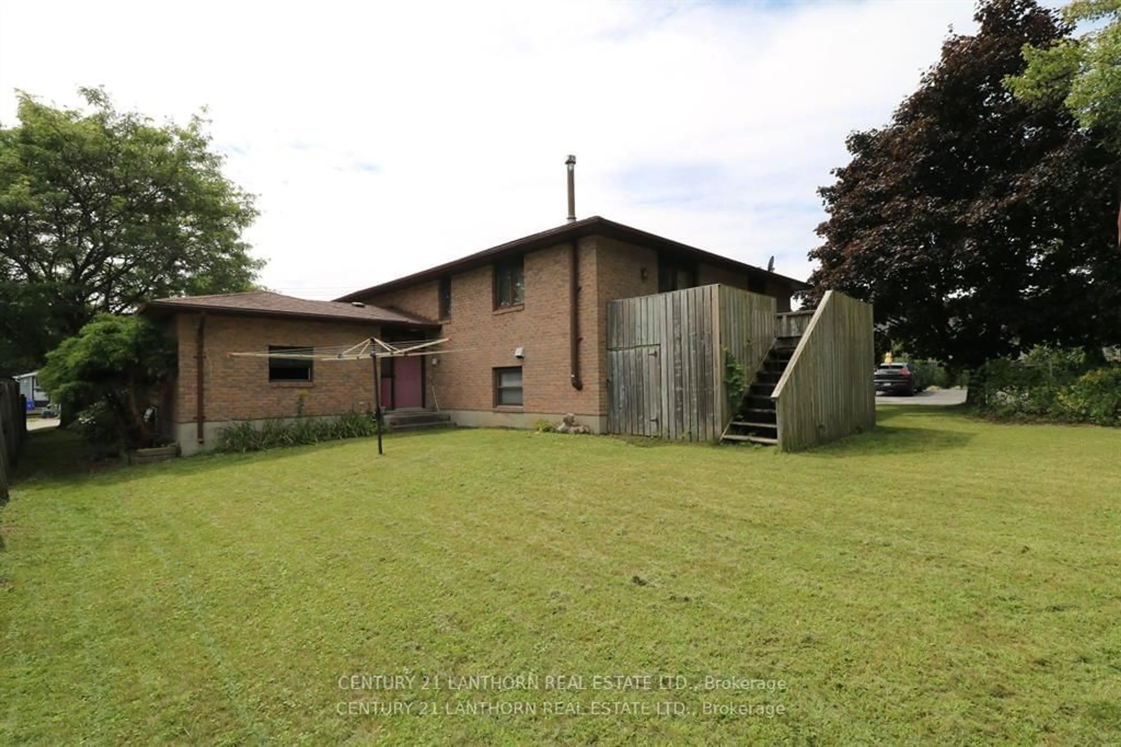 Frontside or backside of a home, the front or back of building for 52 Washburn St, Prince Edward County Ontario K0K 2T0