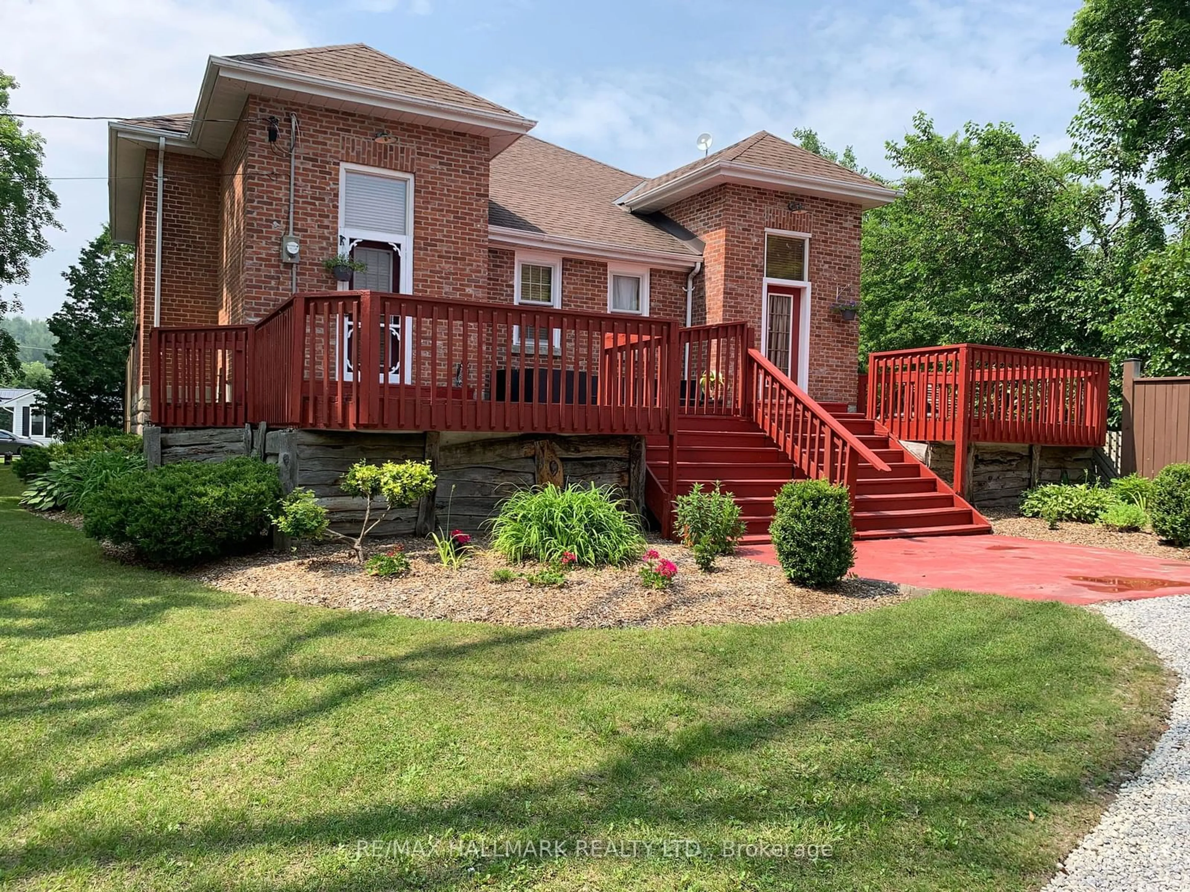 Frontside or backside of a home, the fenced backyard for 157 Norway St, Cramahe Ontario K0K 1M0