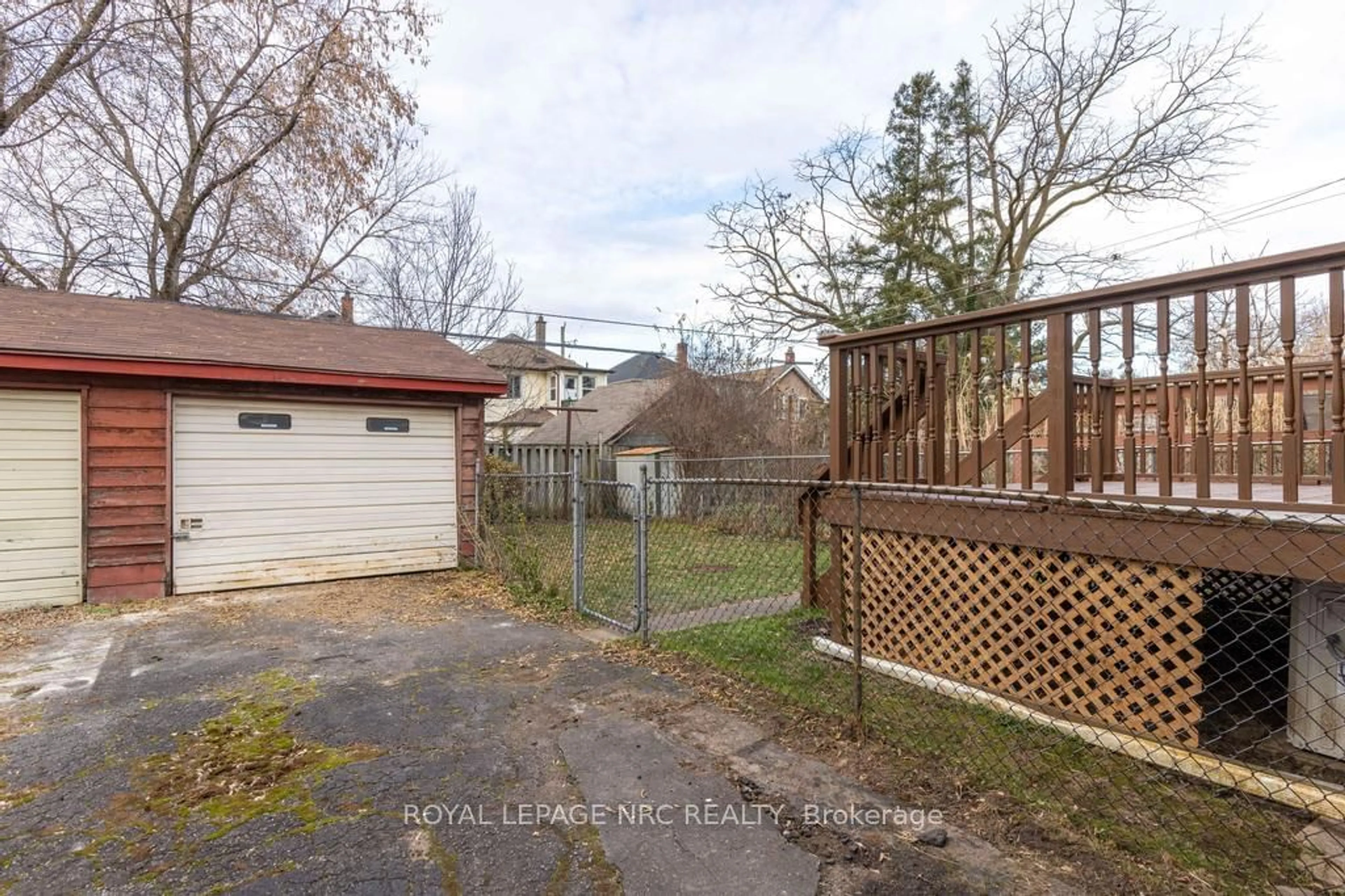 Frontside or backside of a home, the fenced backyard for 7 Chaplin Ave, St. Catharines Ontario L2R 2E4