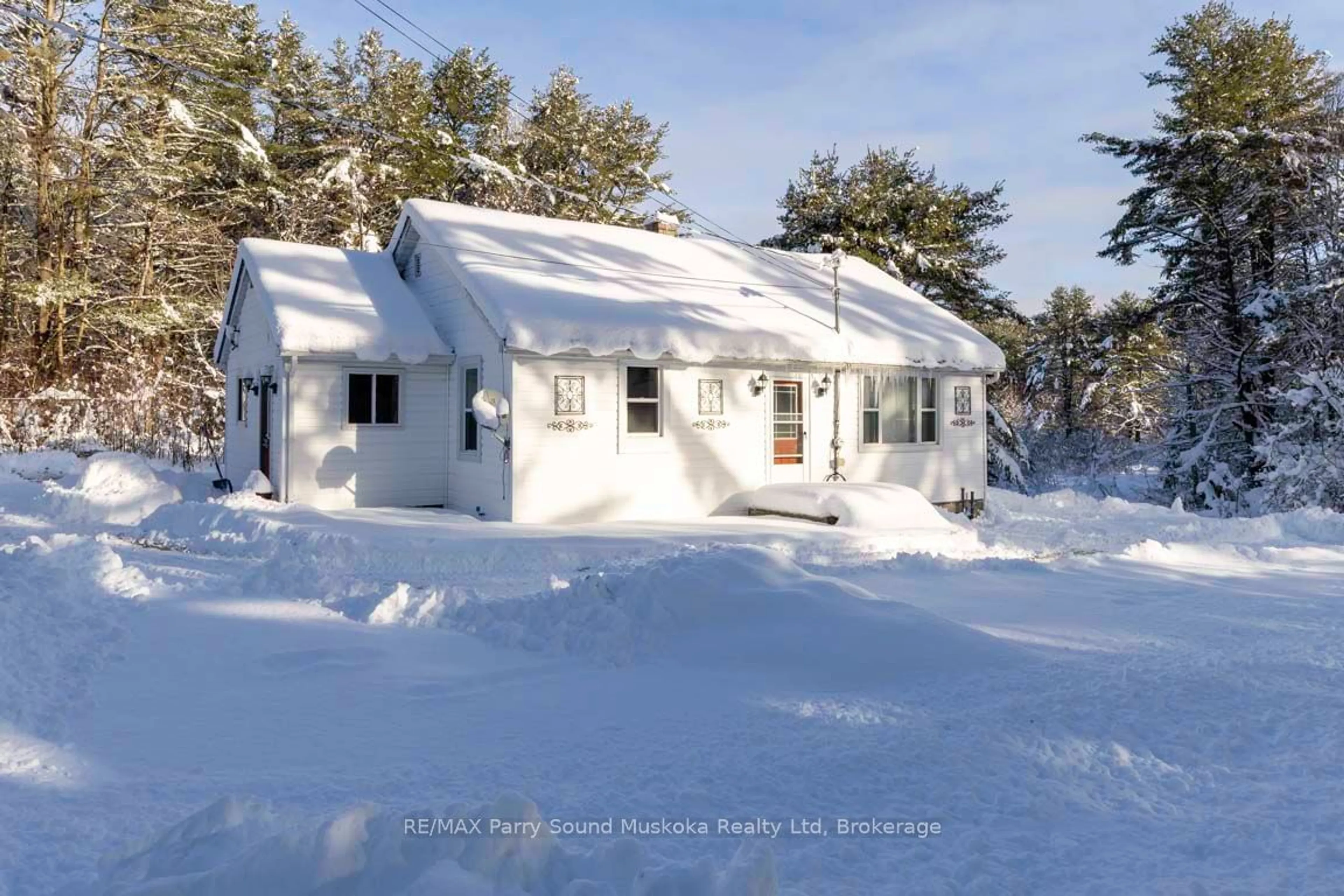 Frontside or backside of a home, cottage for 310 Rankin Lake Rd, Seguin Ontario P2A 0B2