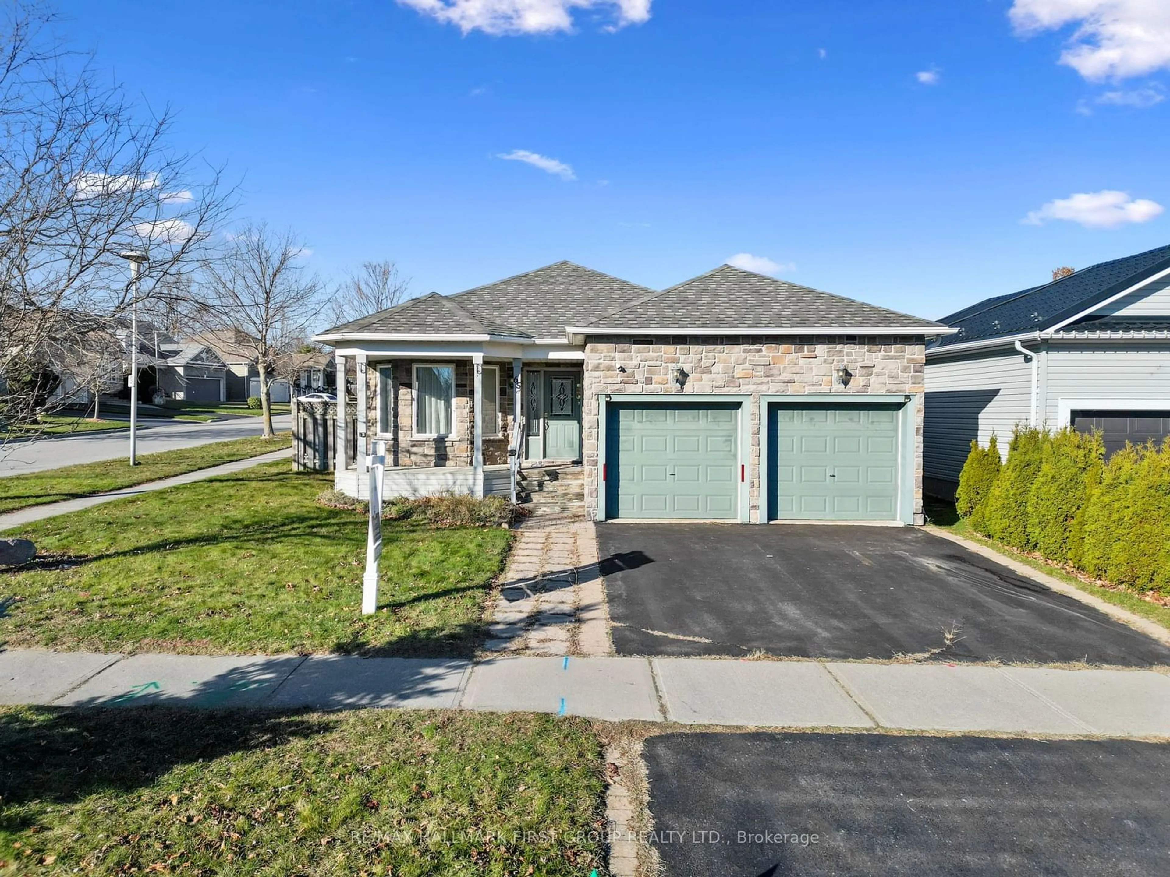 Frontside or backside of a home, the street view for 65 Jarvis Dr, Port Hope Ontario L1A 4K5