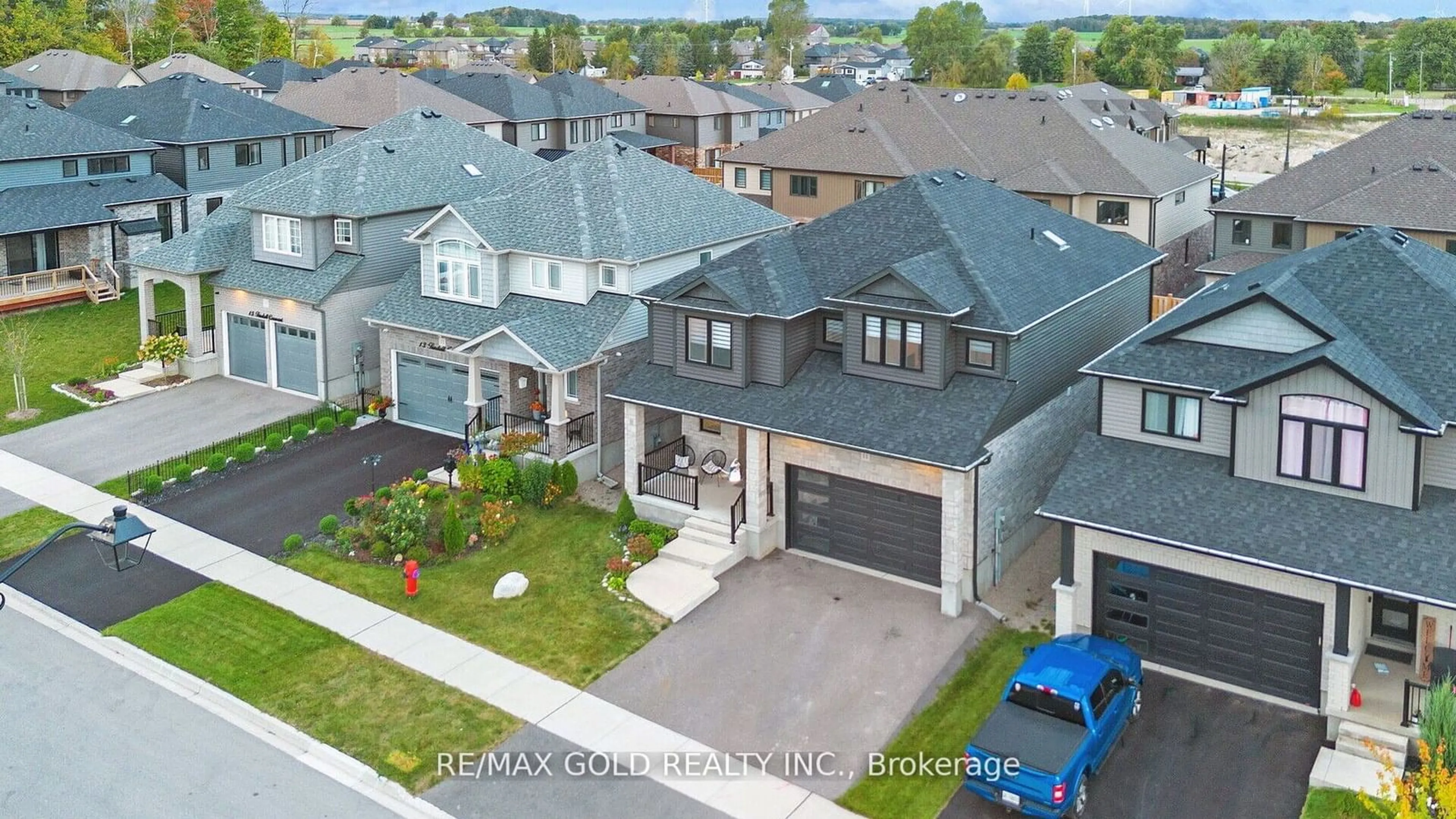 Frontside or backside of a home, the street view for 11 Tindall Cres, East Luther Grand Valley Ontario L9W 6P4