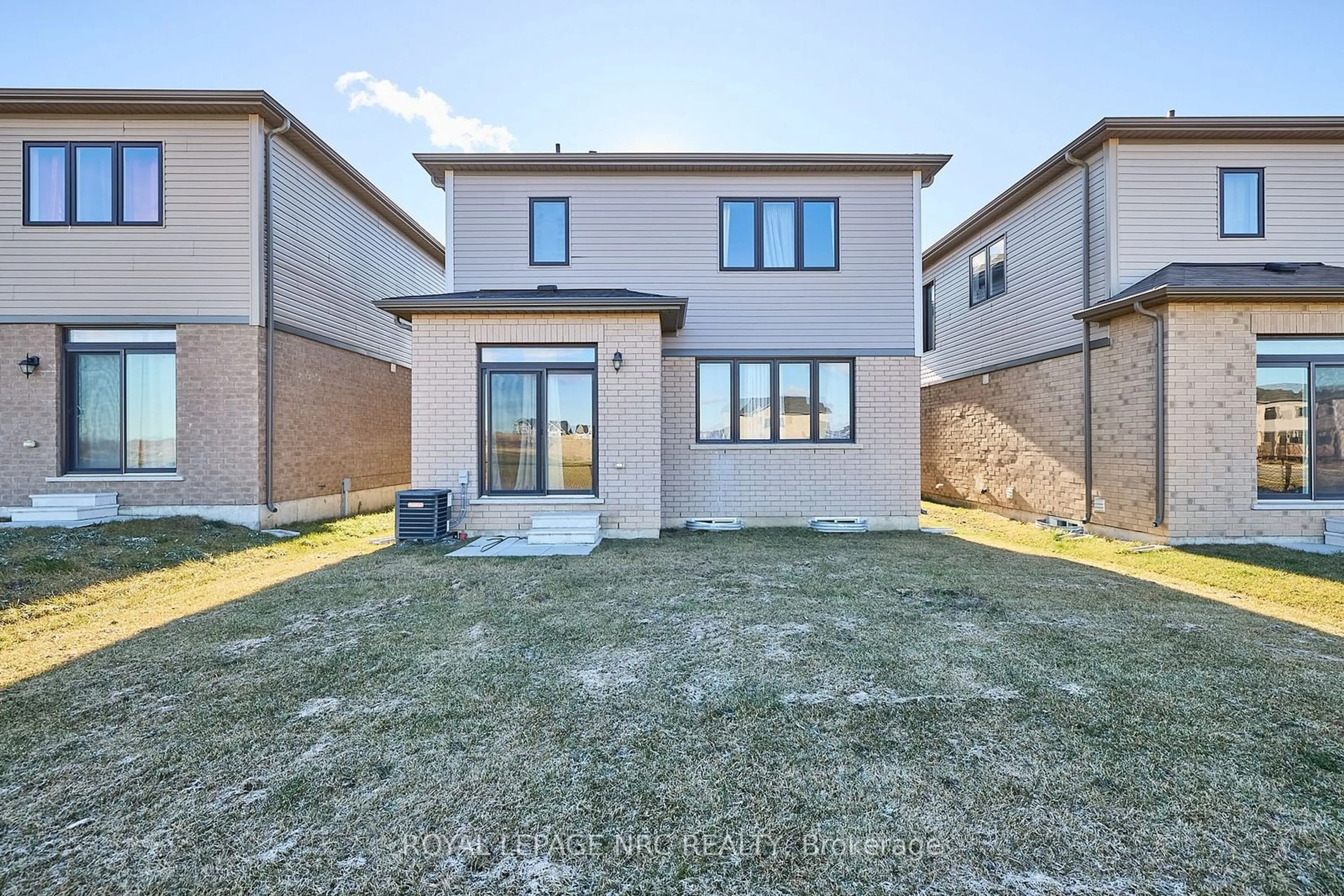 Frontside or backside of a home, the fenced backyard for 10 Peach St, Thorold Ontario L2V 0K1