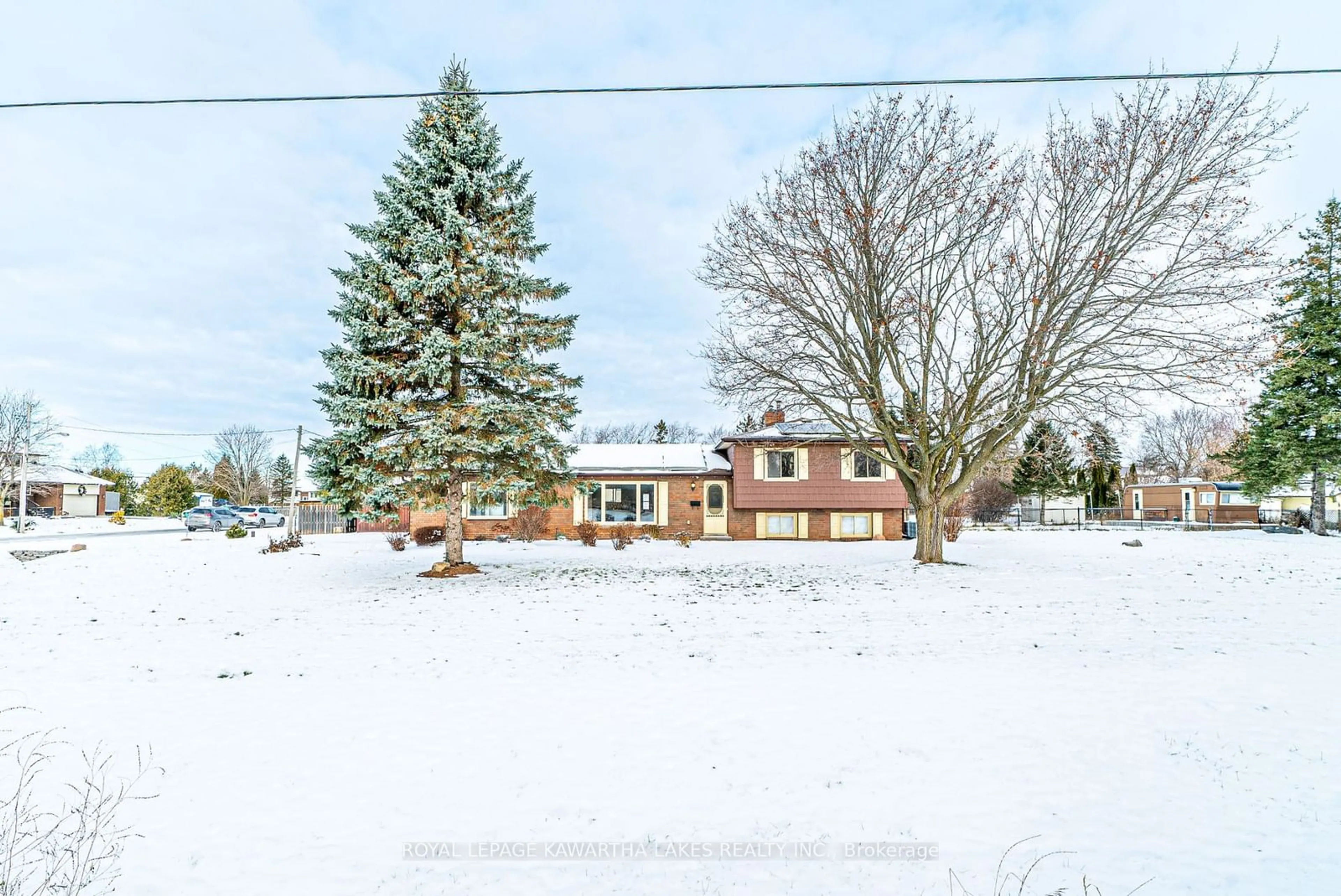 Frontside or backside of a home, the street view for 2 Maxwell St, Kawartha Lakes Ontario K0M 1L0