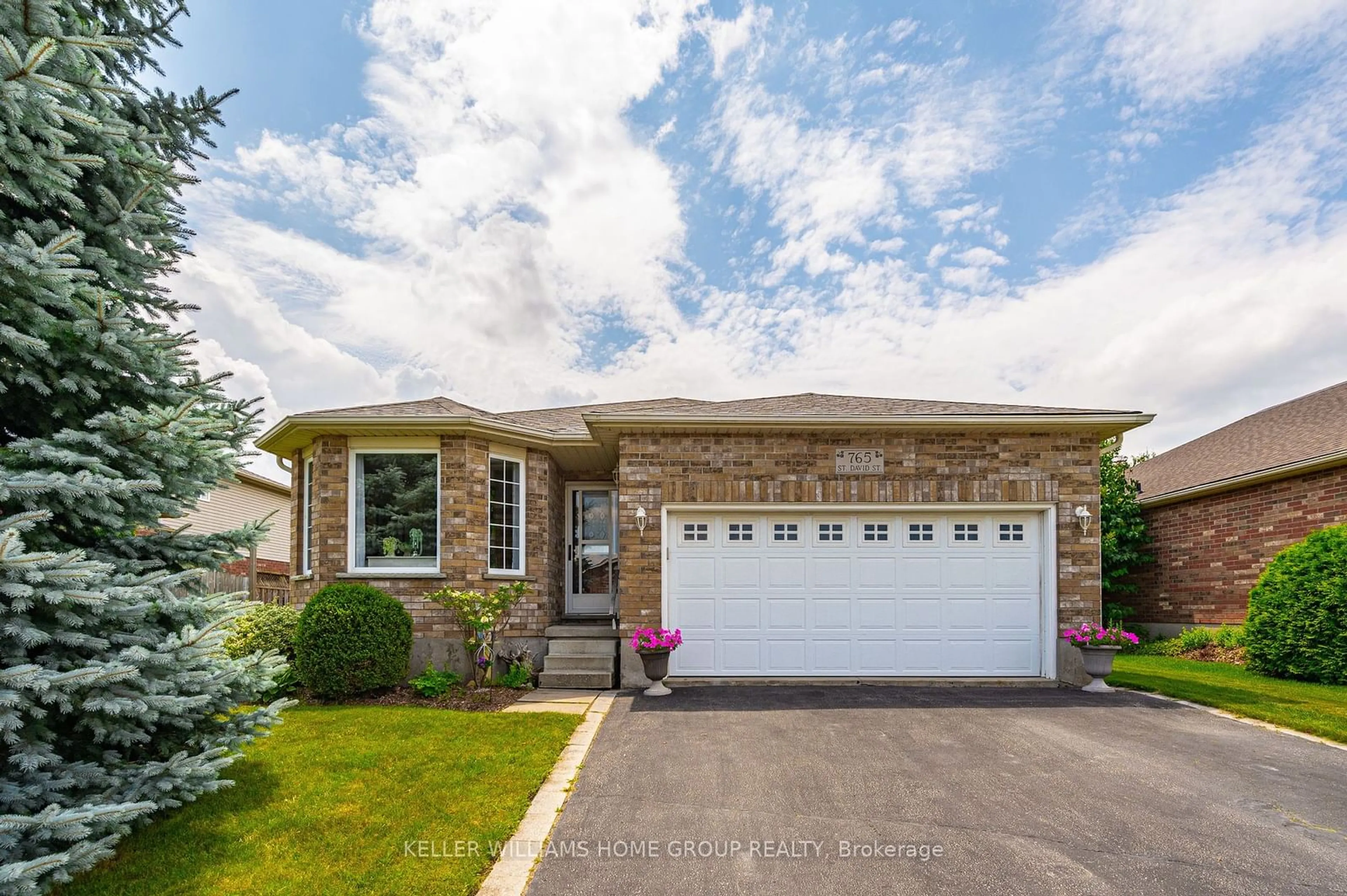 Home with brick exterior material for 765 St. David St, Centre Wellington Ontario N1M 3V1