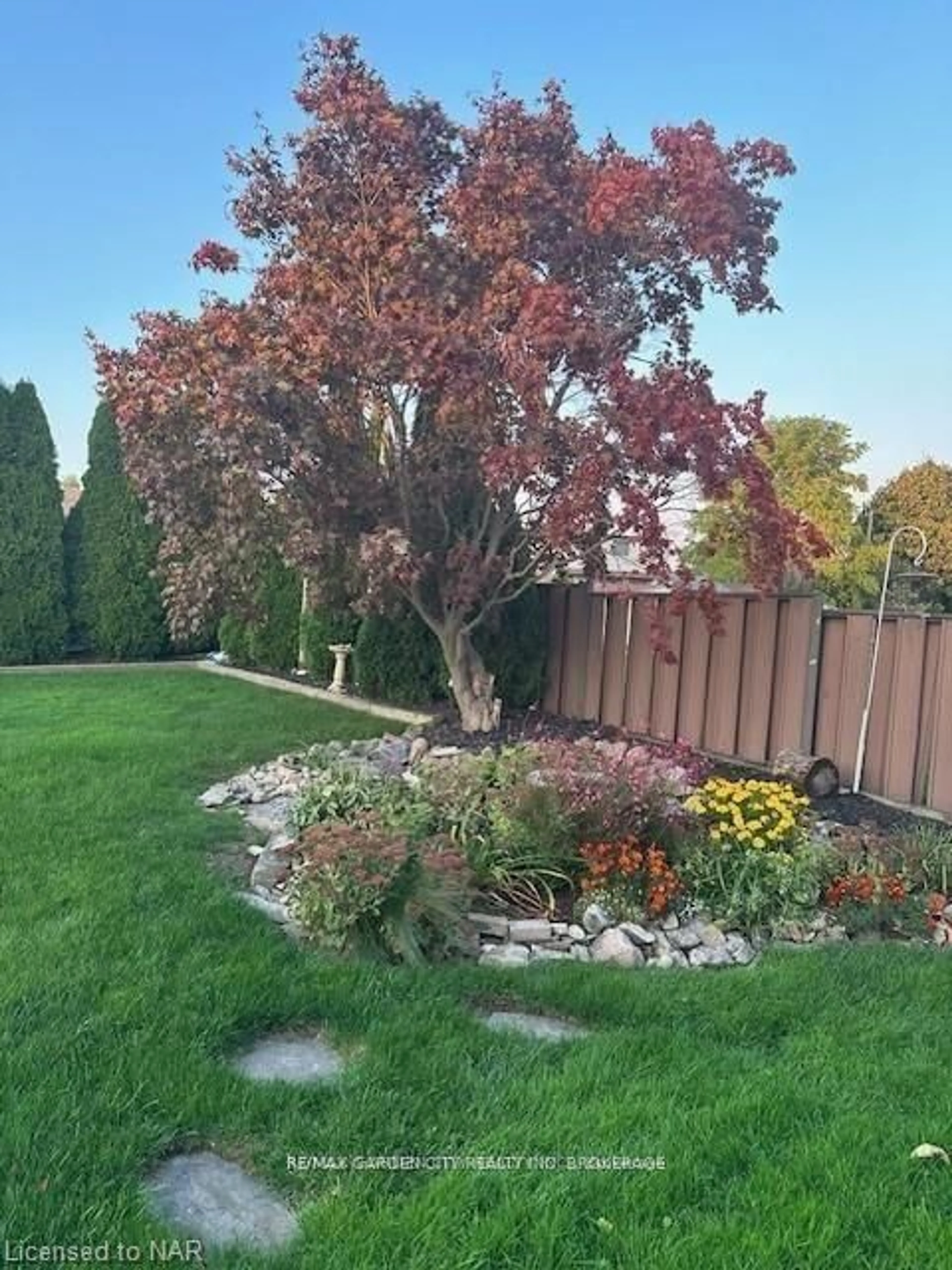 Patio, the fenced backyard for 48 Mcdonald Ave, Thorold Ontario L2V 3E6