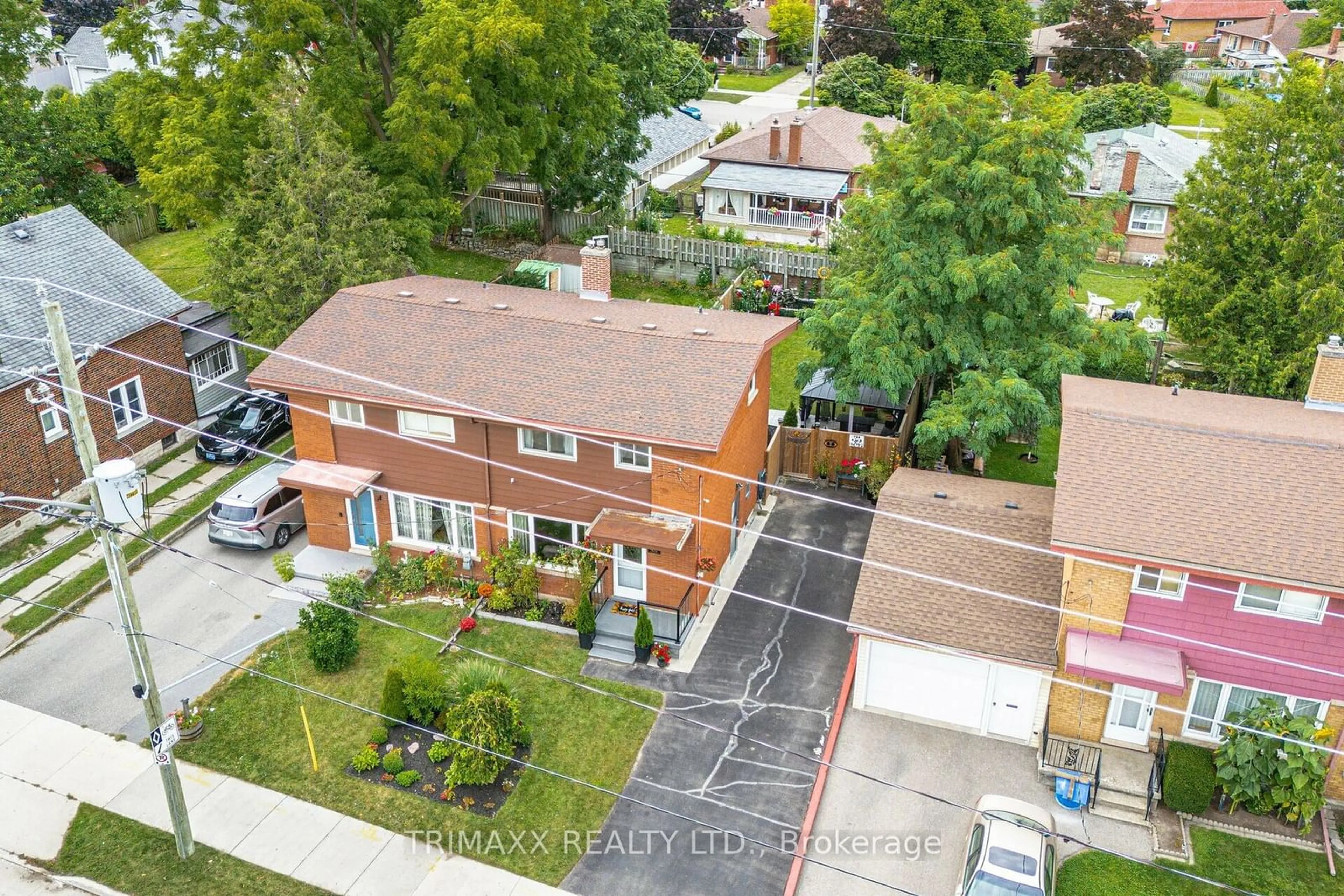 Frontside or backside of a home, the street view for 452 Ottawa St, Kitchener Ontario N2M 3P5