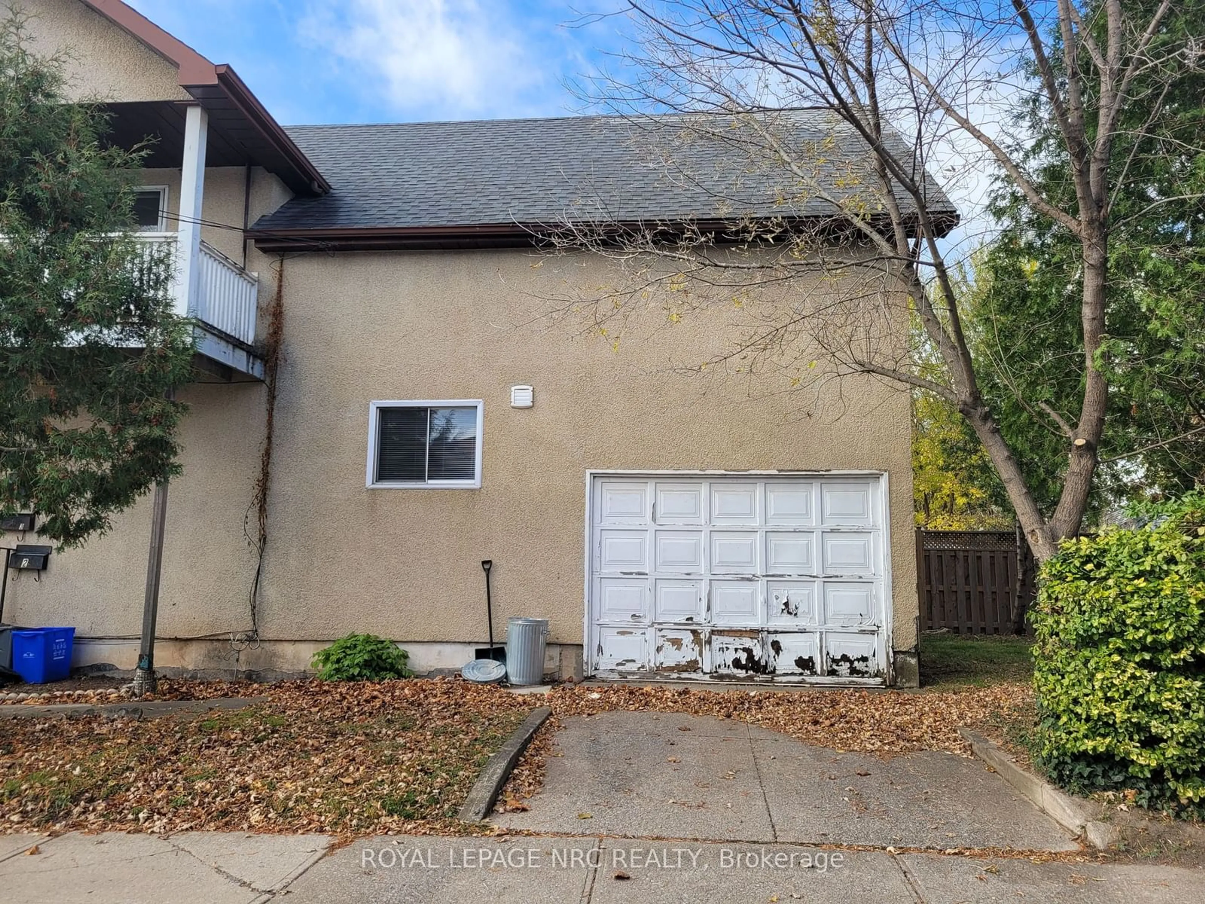 Frontside or backside of a home, the fenced backyard for 44 Albert St, Welland Ontario L3B 4L2