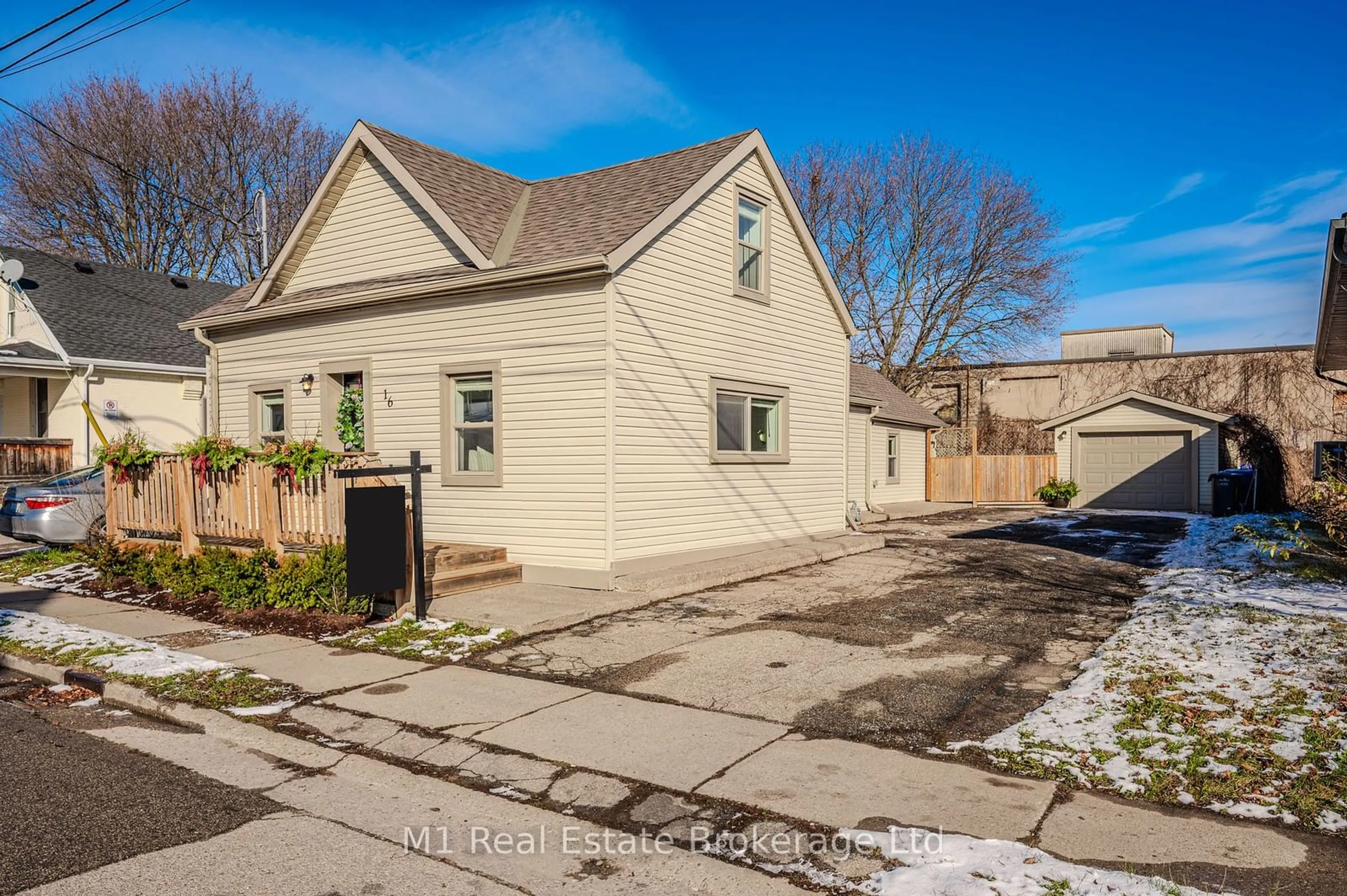 Frontside or backside of a home, the street view for 16 Hooper St, Guelph Ontario N1E 5W5