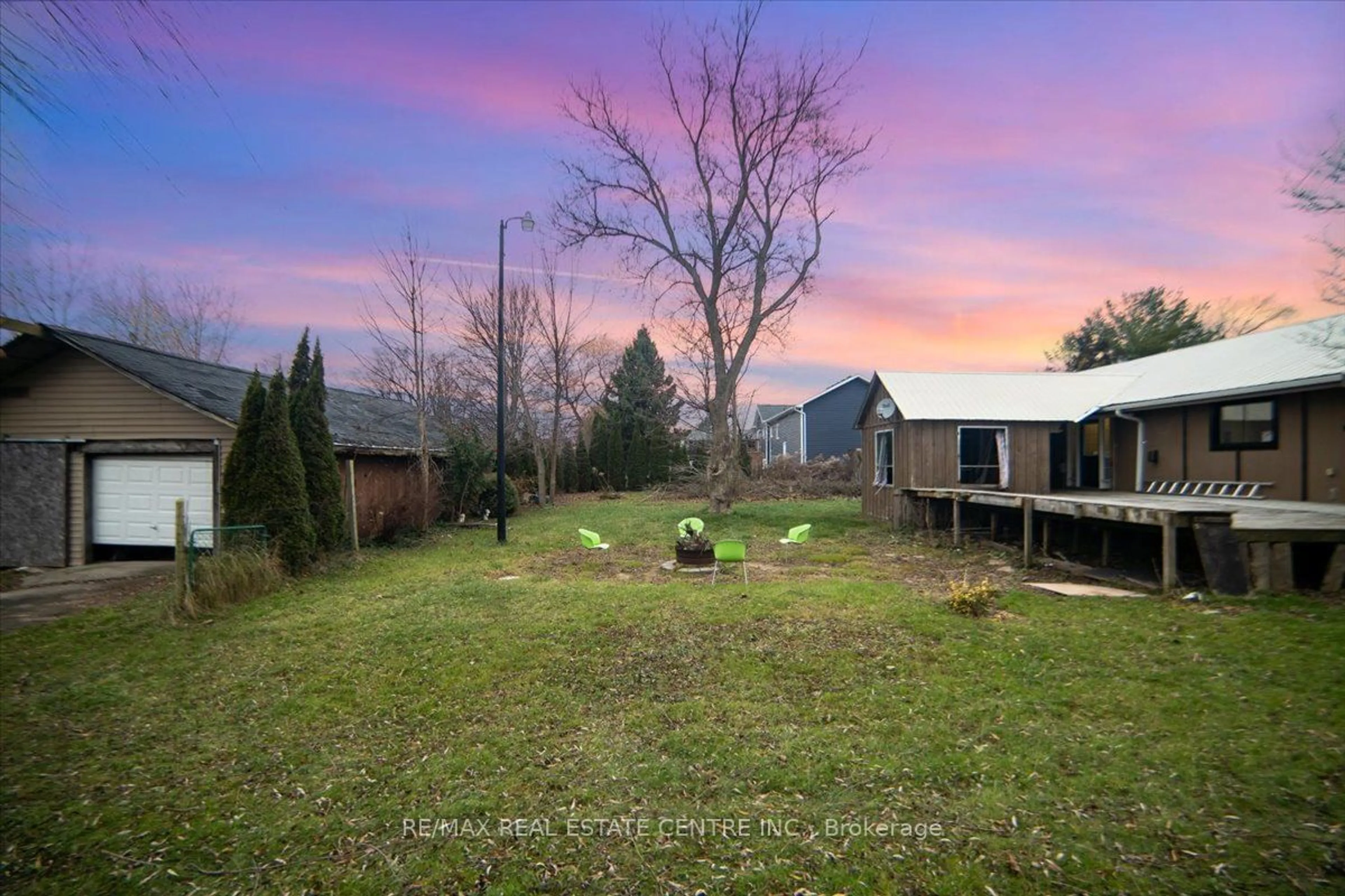 Frontside or backside of a home, the fenced backyard for 20527 Melbourne Rd, Strathroy-Caradoc Ontario N0L 1T0