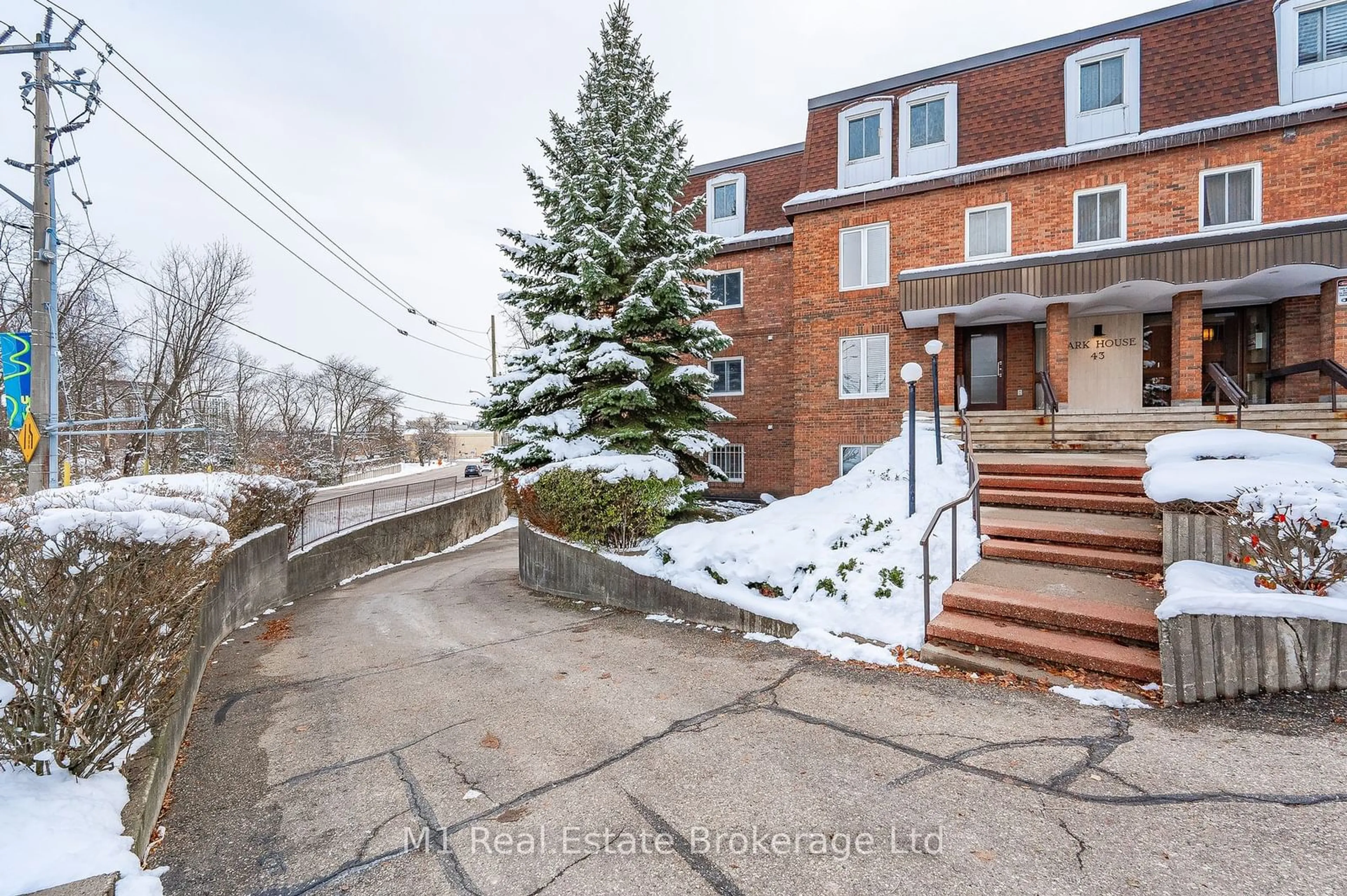 A pic from exterior of the house or condo, the street view for 43 Caroline St #302, Waterloo Ontario N2L 2Y5