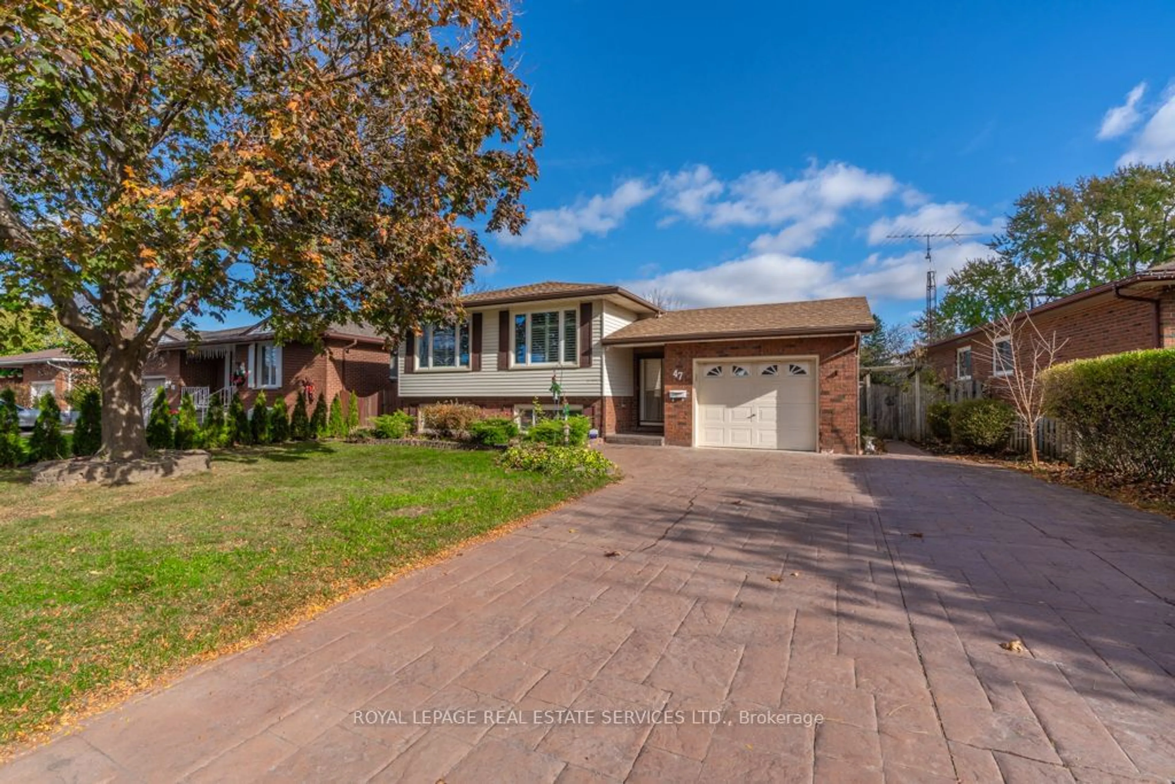 Frontside or backside of a home, the street view for 47 Westfield Dr, St. Catharines Ontario L2N 5Z5