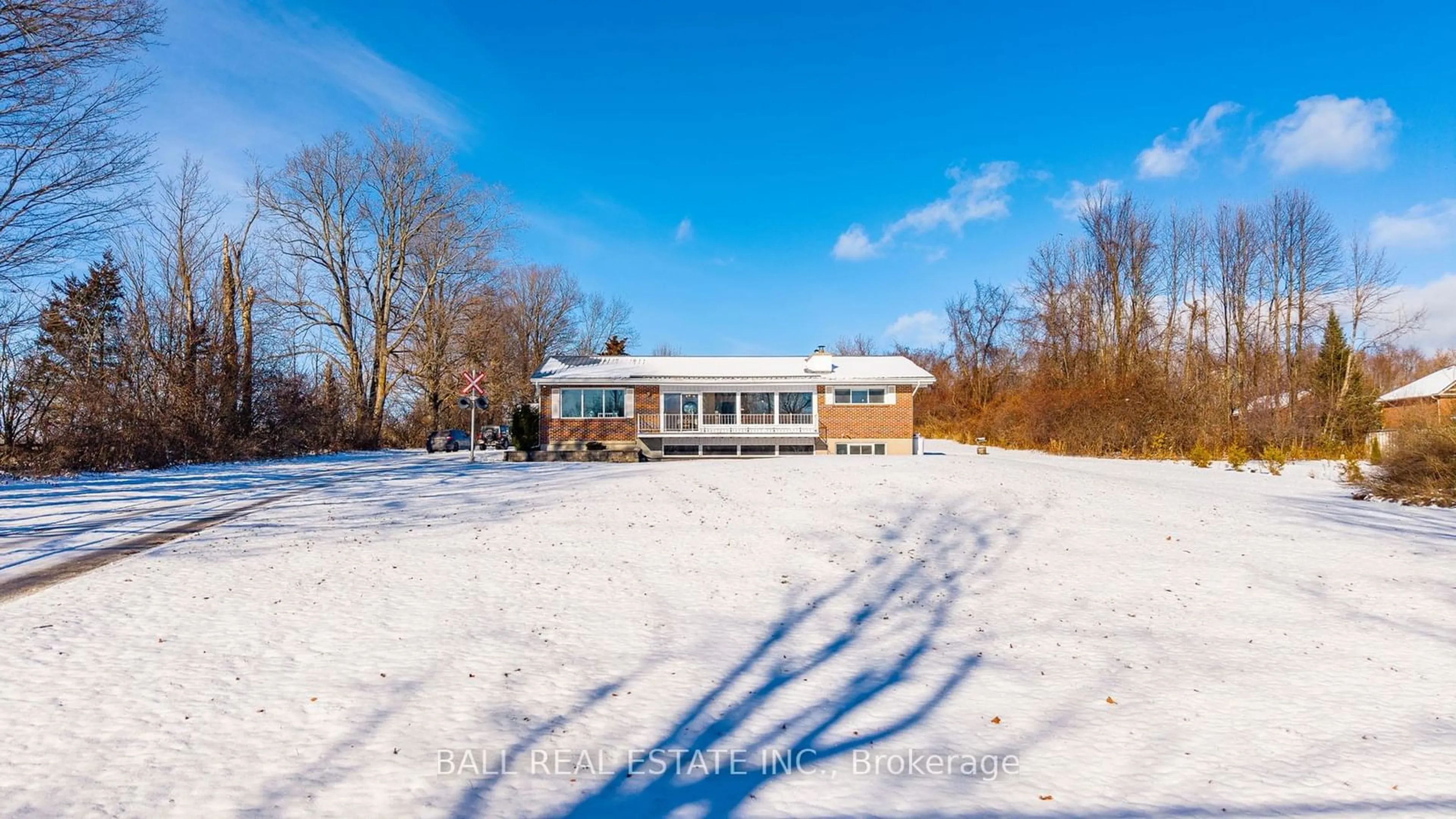 A pic from exterior of the house or condo, the fenced backyard for 1975 County Road 8, Kawartha Lakes Ontario K0M 1A0