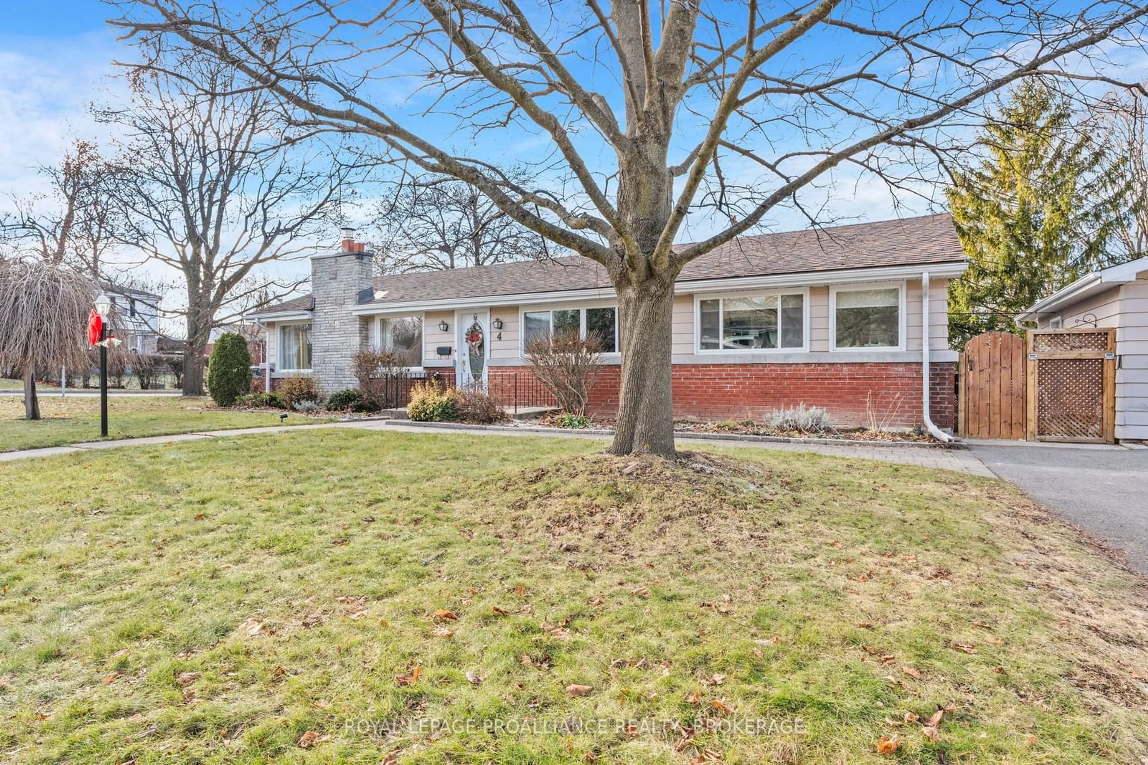 Frontside or backside of a home, the fenced backyard for 4 Strathcona Cres, Kingston Ontario K7M 1N8