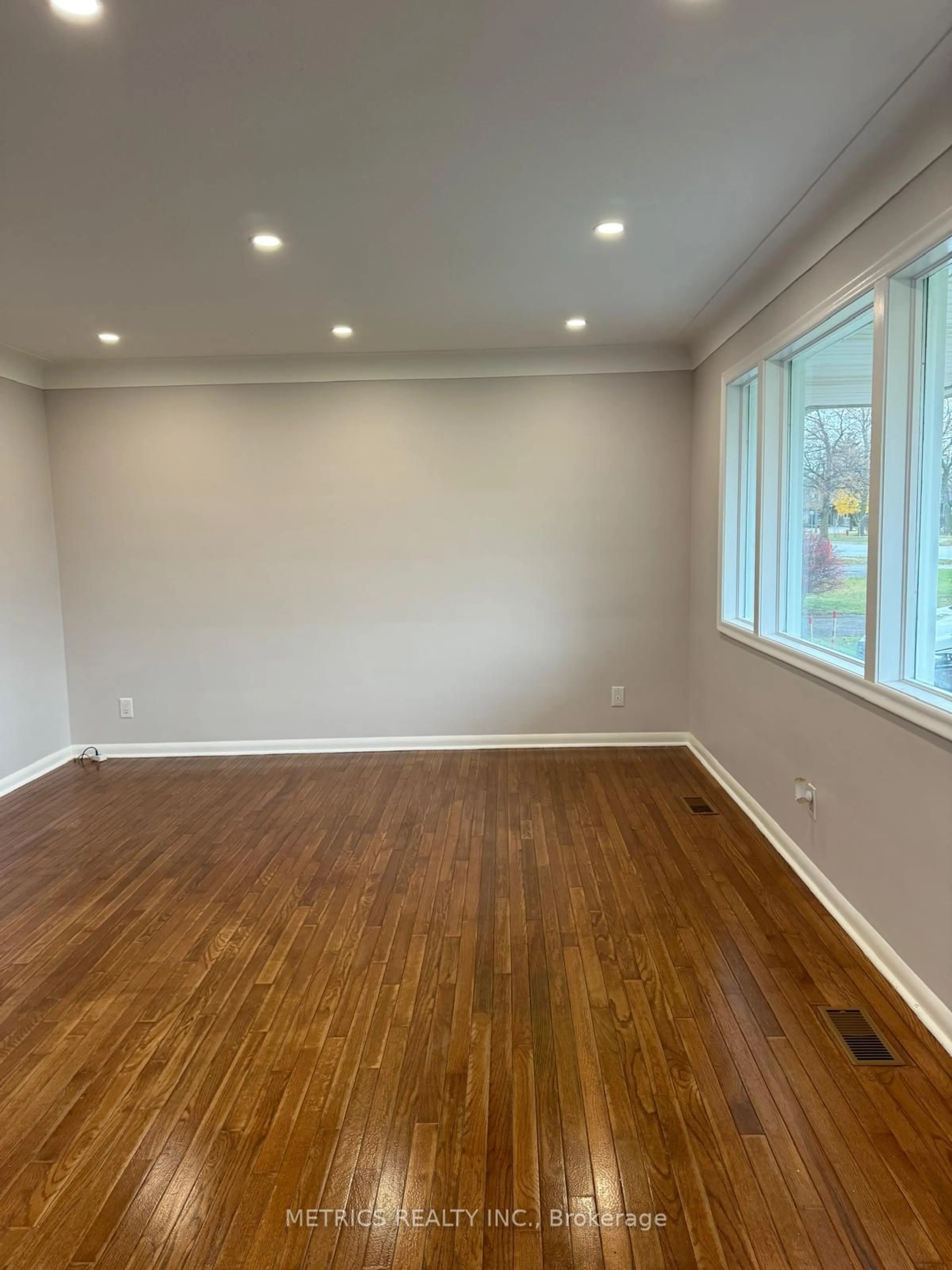 A pic of a room, wood floors for 4443 Dorchester Rd, Niagara Falls Ontario L2E 6N5