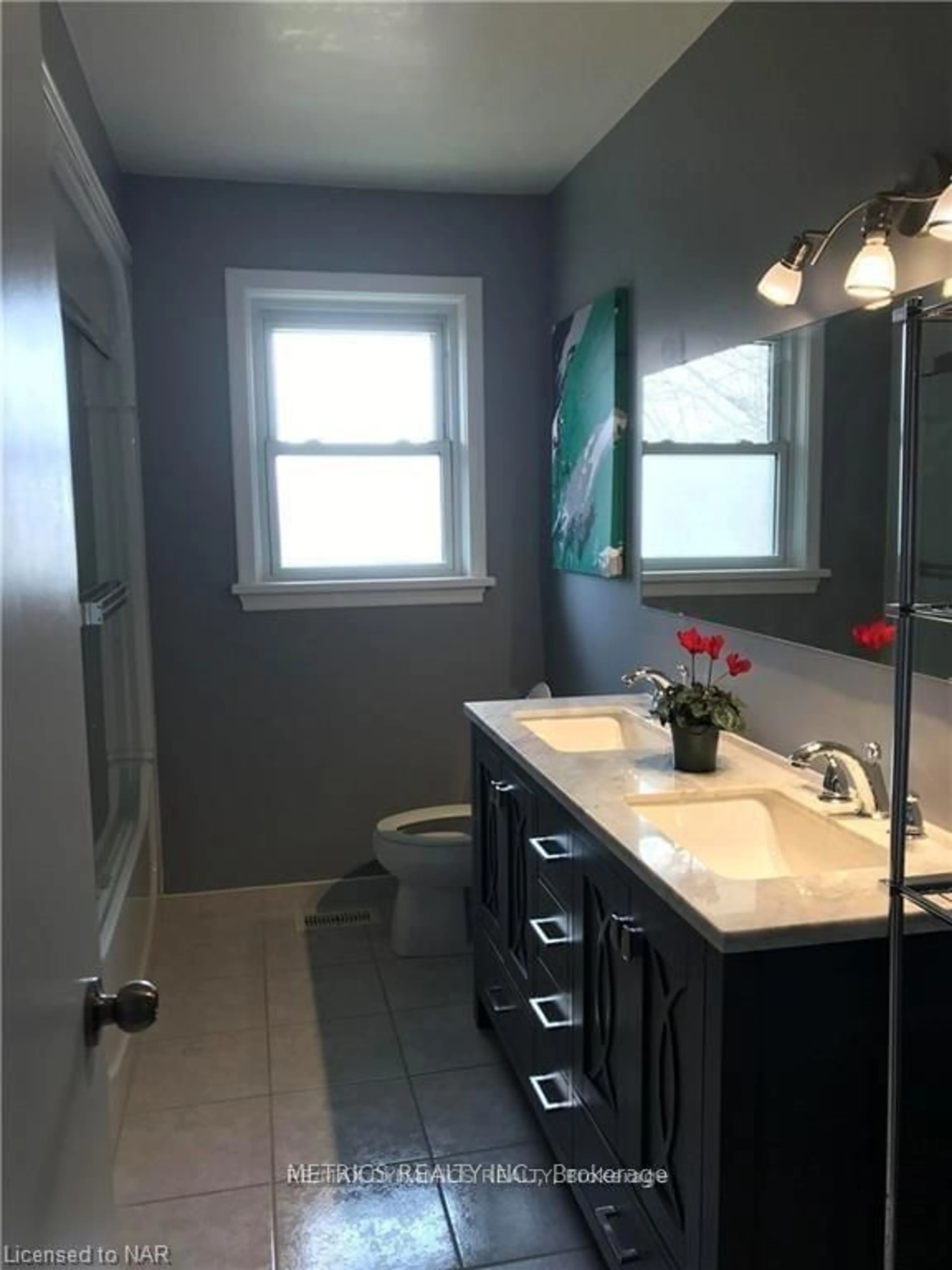 Contemporary bathroom, wood floors for 4443 Dorchester Rd, Niagara Falls Ontario L2E 6N5