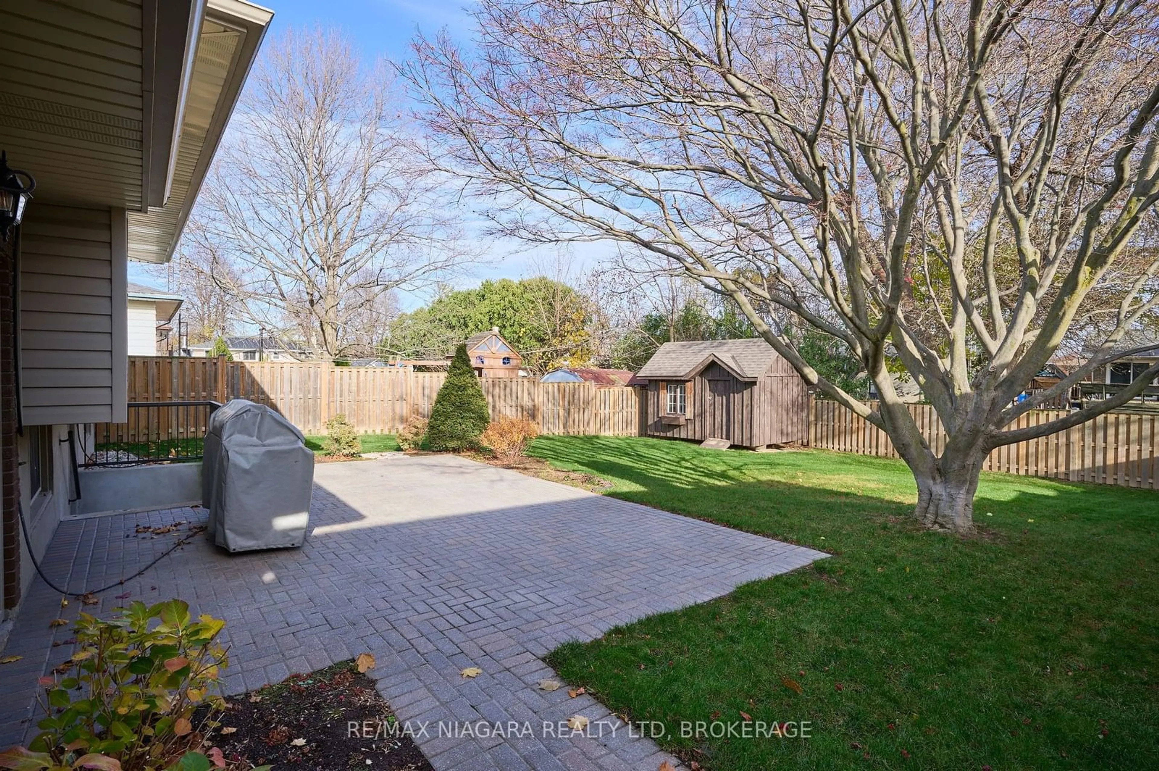 Patio, the fenced backyard for 100 Sherman Dr, St. Catharines Ontario L2N 2L5