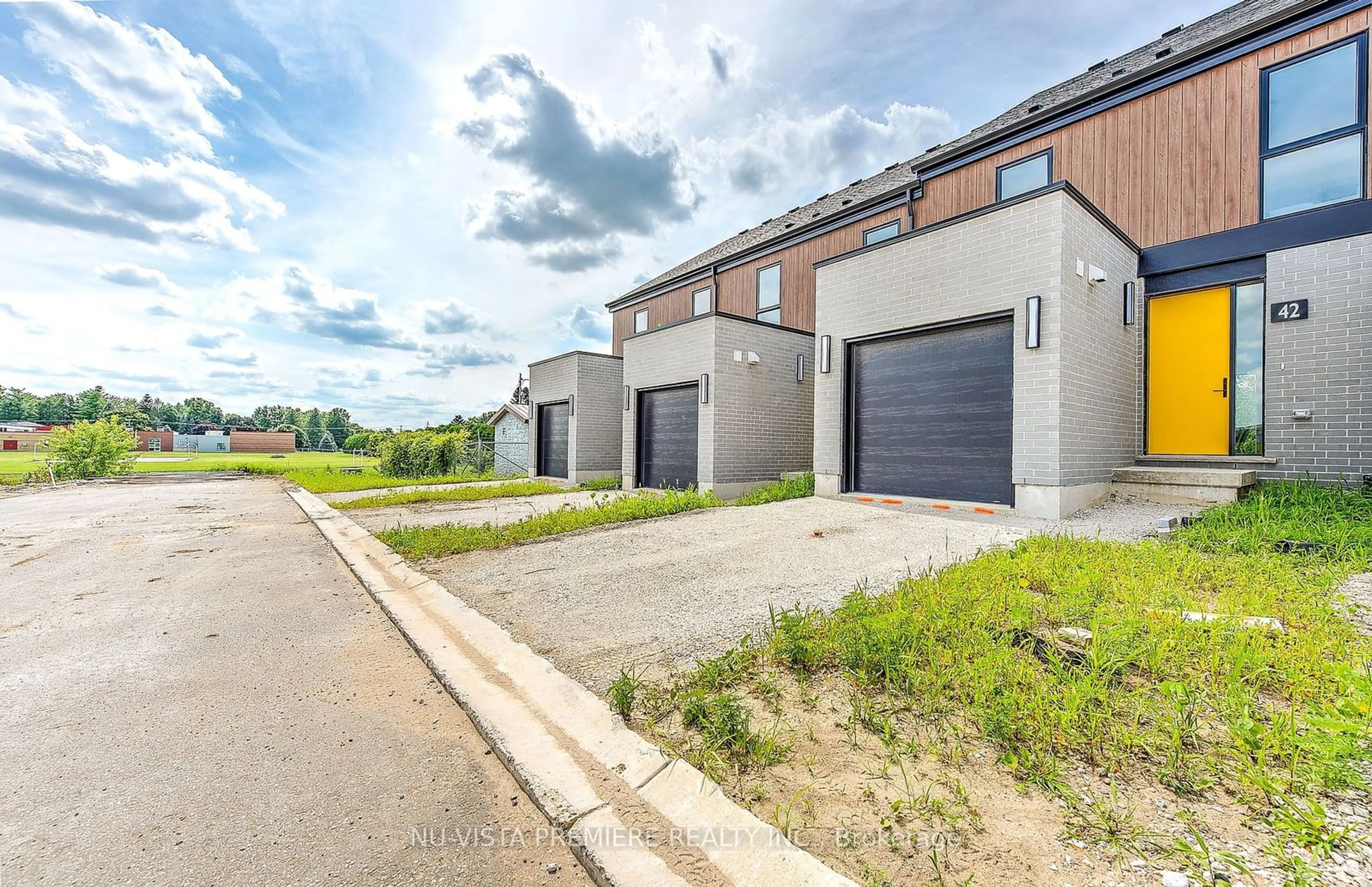 A pic from exterior of the house or condo, the street view for 85 Tunks Lane #42, Middlesex Centre Ontario N0L 1R0