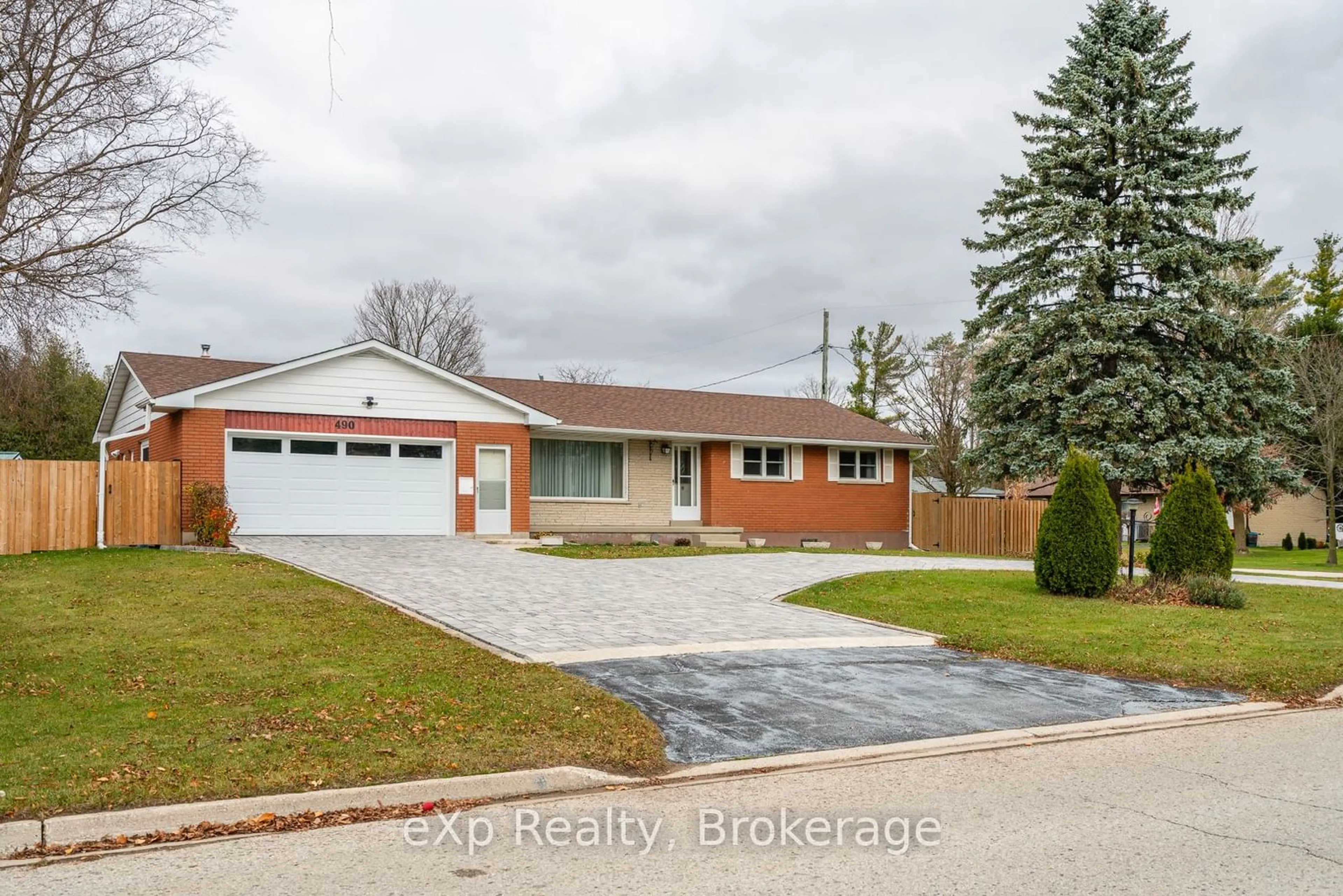 Frontside or backside of a home, the street view for 490 Saddler St, West Grey Ontario N0G 1R0