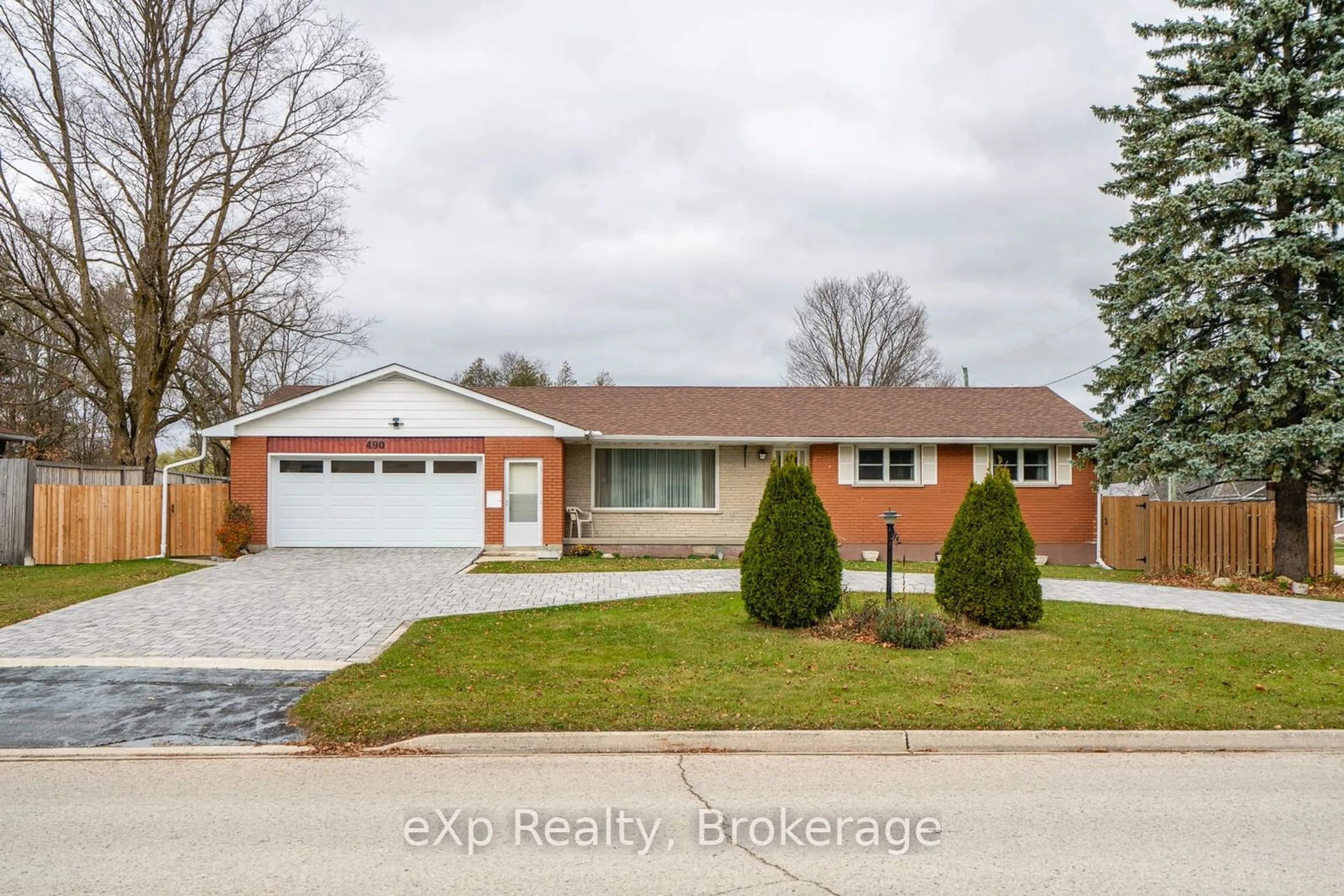 Frontside or backside of a home, the street view for 490 Saddler St, West Grey Ontario N0G 1R0