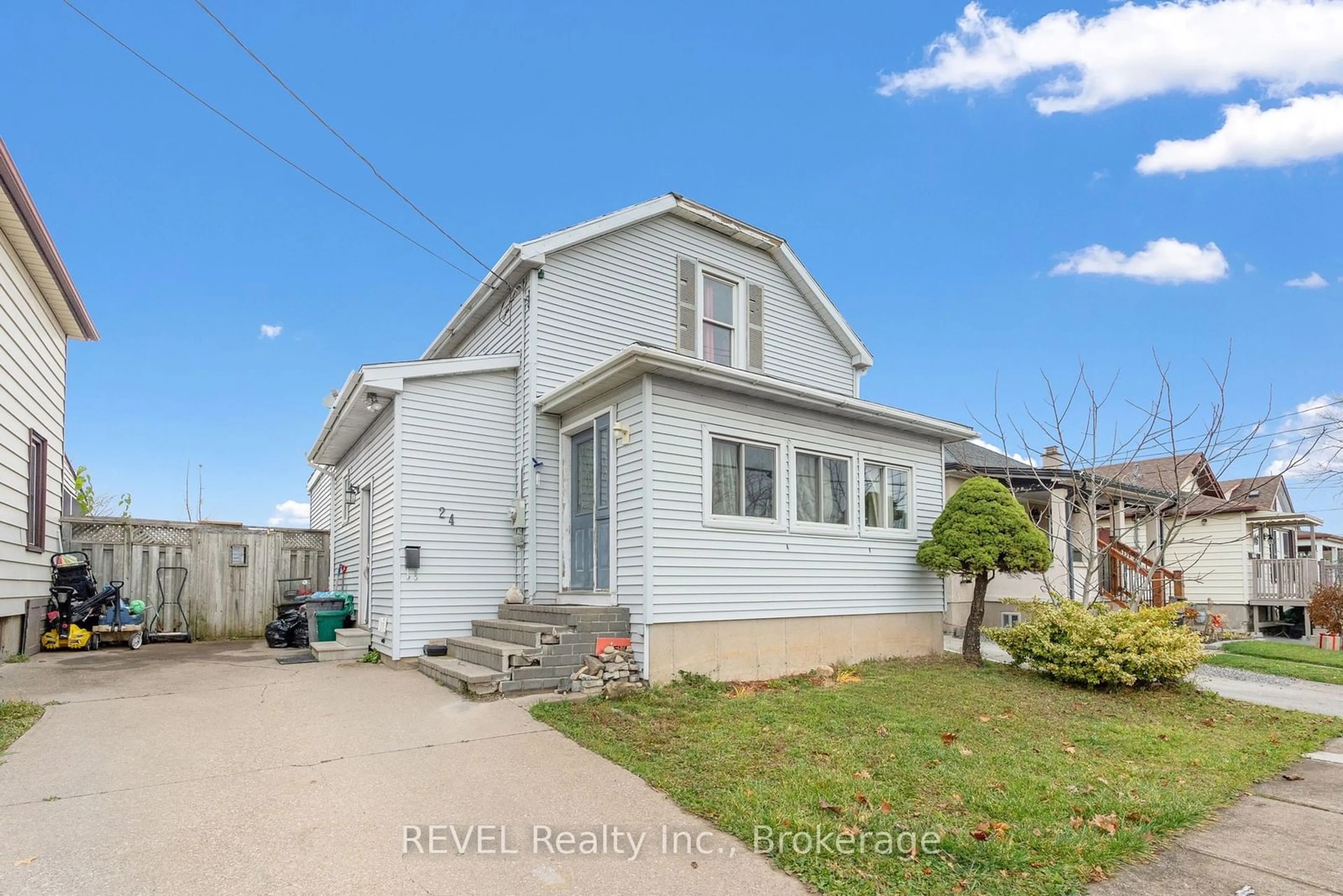 Frontside or backside of a home, the fenced backyard for 24 Lyndon St, Thorold Ontario L2V 3J7