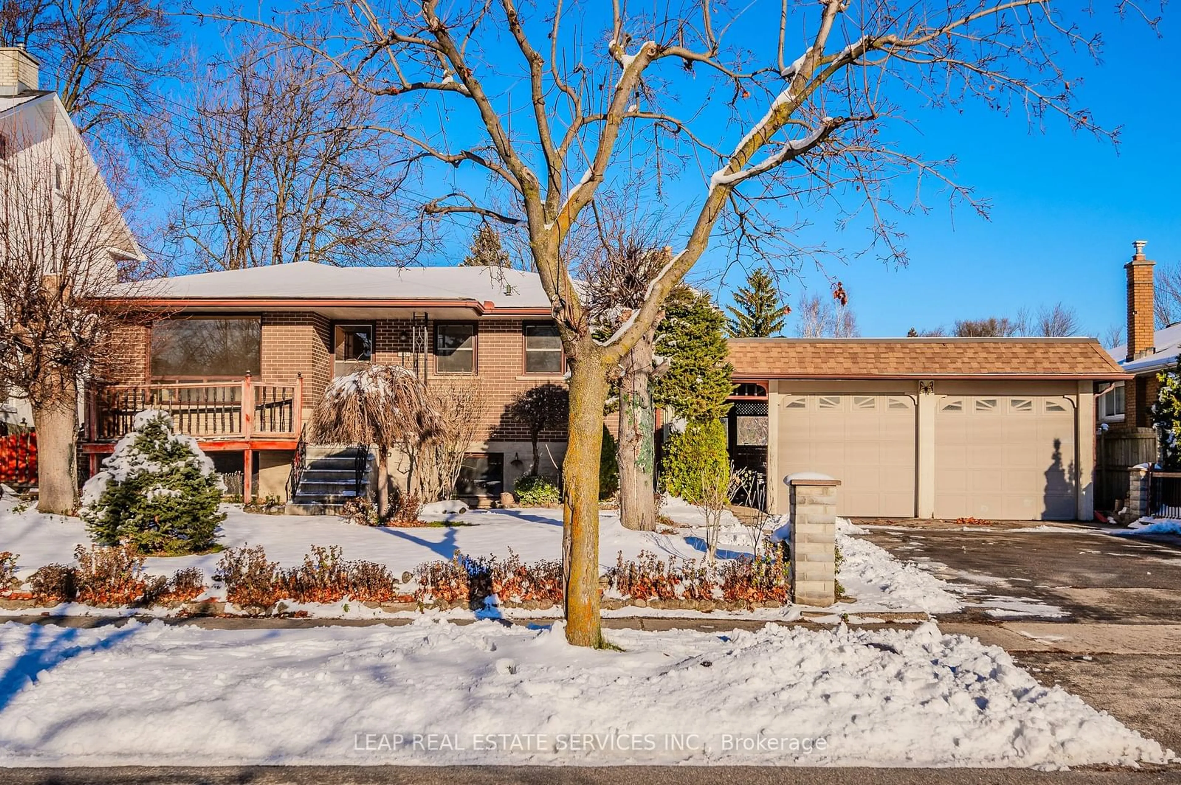 A pic from exterior of the house or condo, the fenced backyard for 80 Kenneth Ave, Kitchener Ontario N2A 1V8