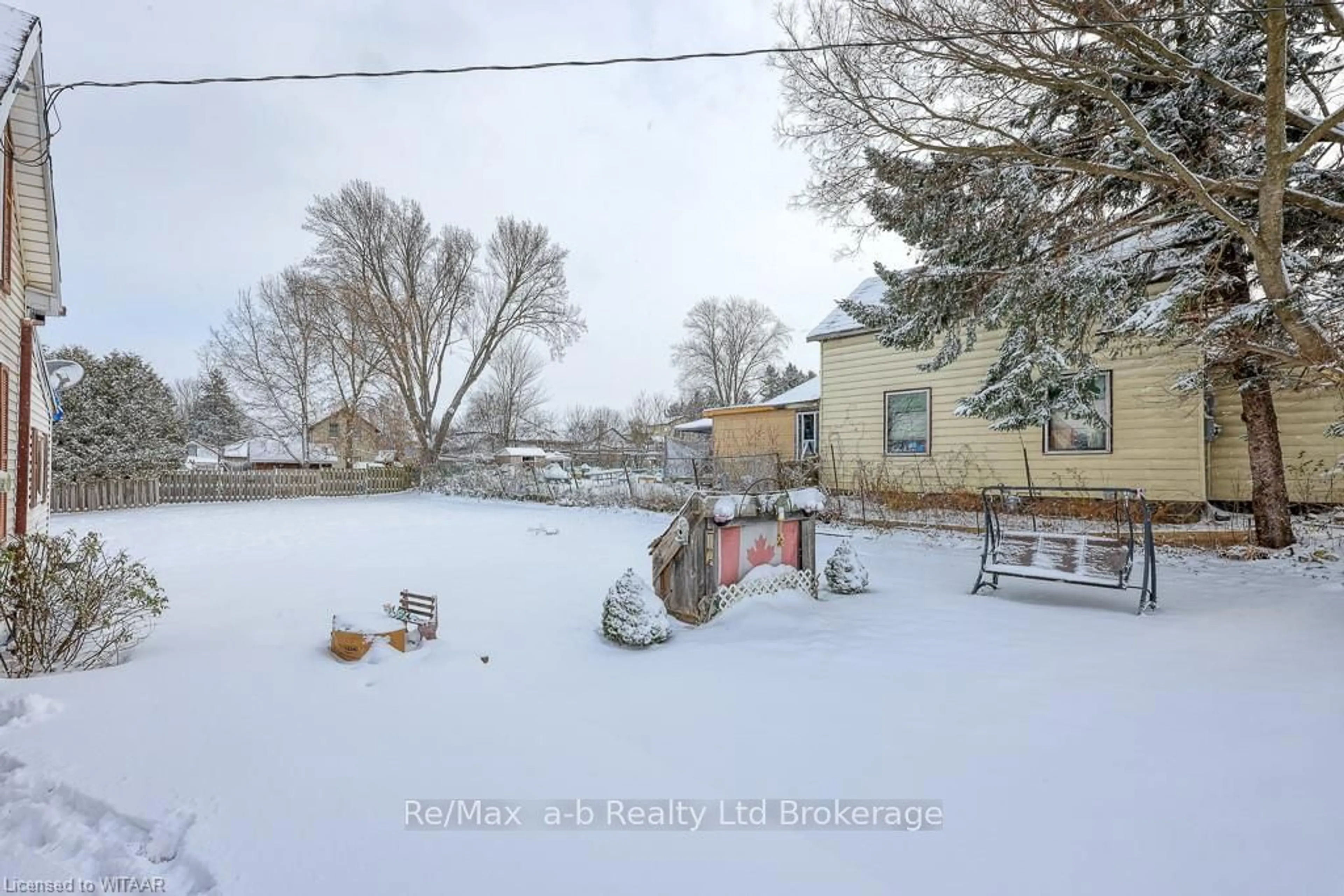 Frontside or backside of a home, the fenced backyard for 125 WHITING St, Ingersoll Ontario N5C 3B2