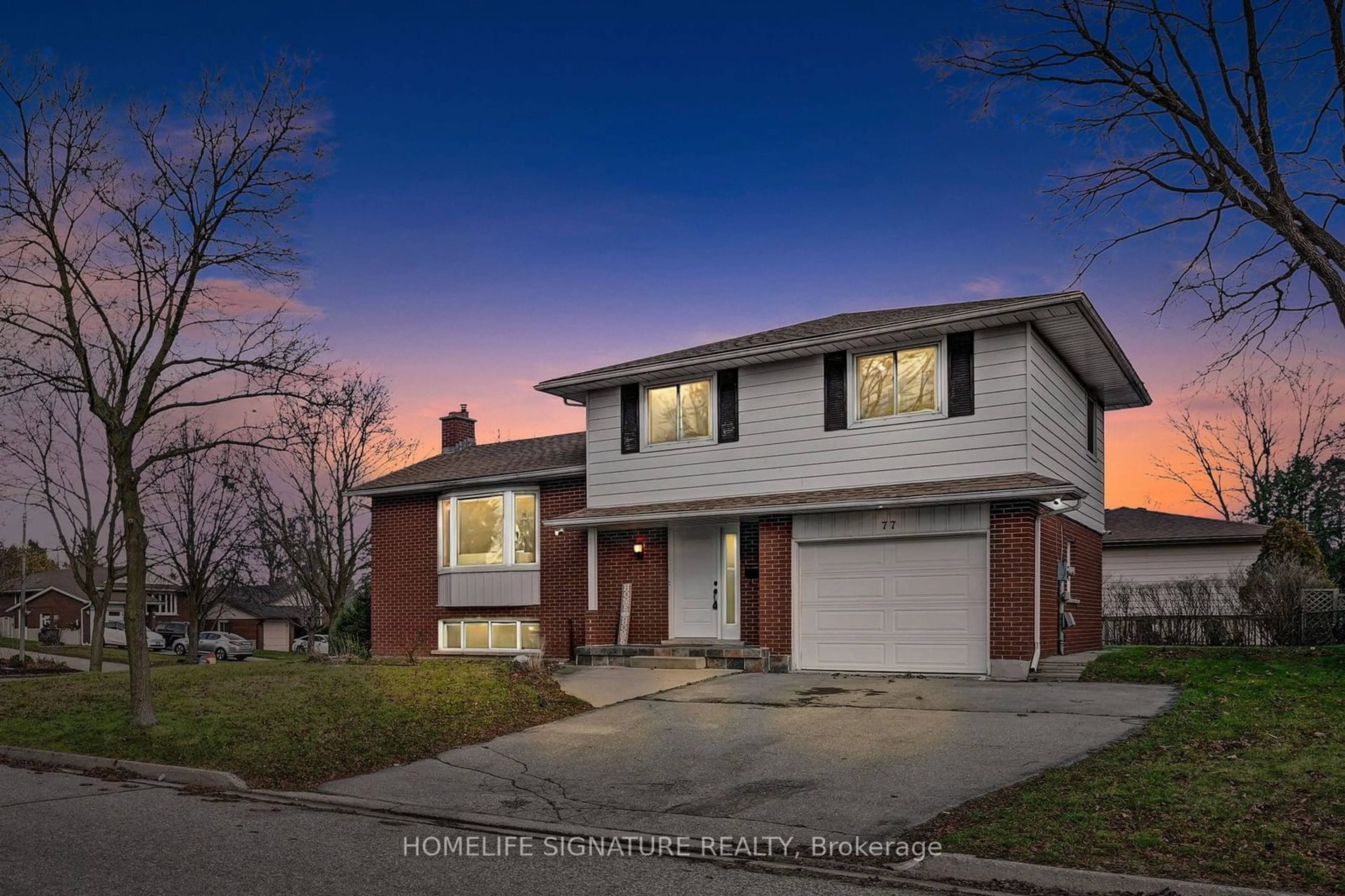 Frontside or backside of a home, the street view for 77 Orchard Mill Cres, Kitchener Ontario N2P 1T2