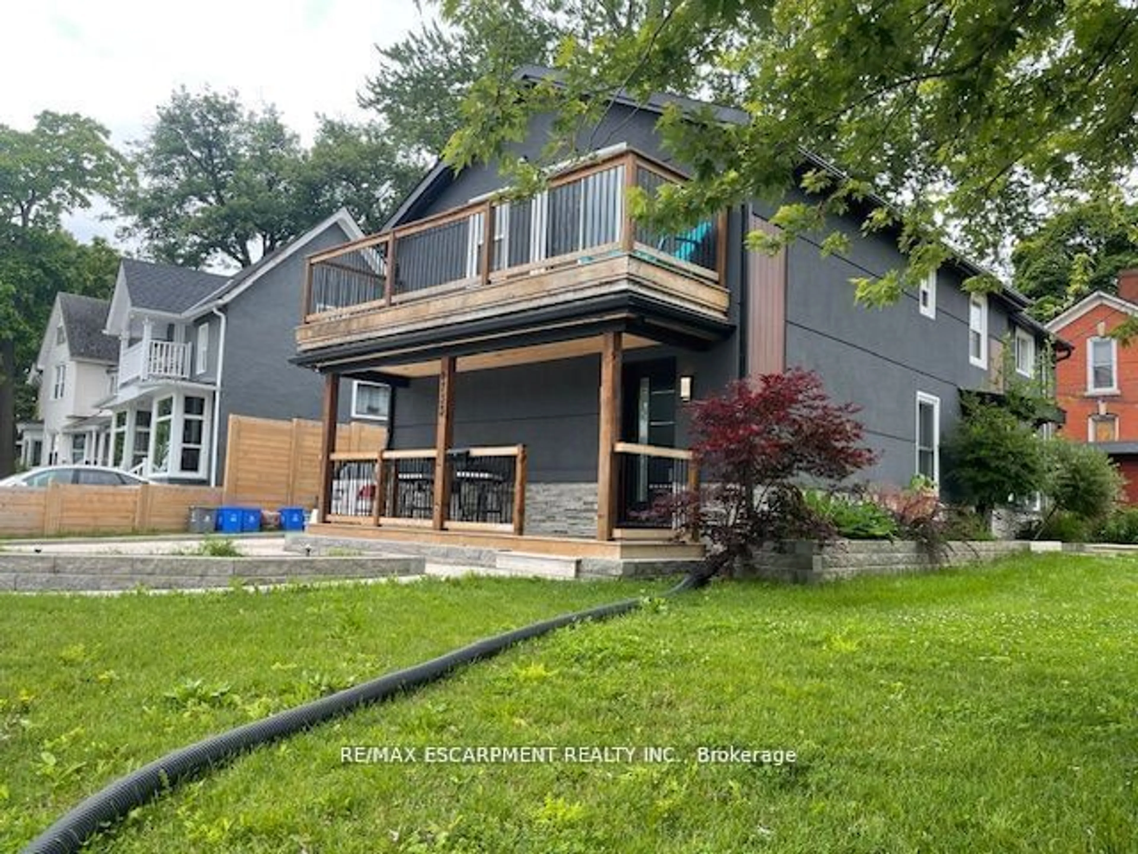 Frontside or backside of a home, the fenced backyard for 4733 River Rd, Niagara Falls Ontario L2E 3G3