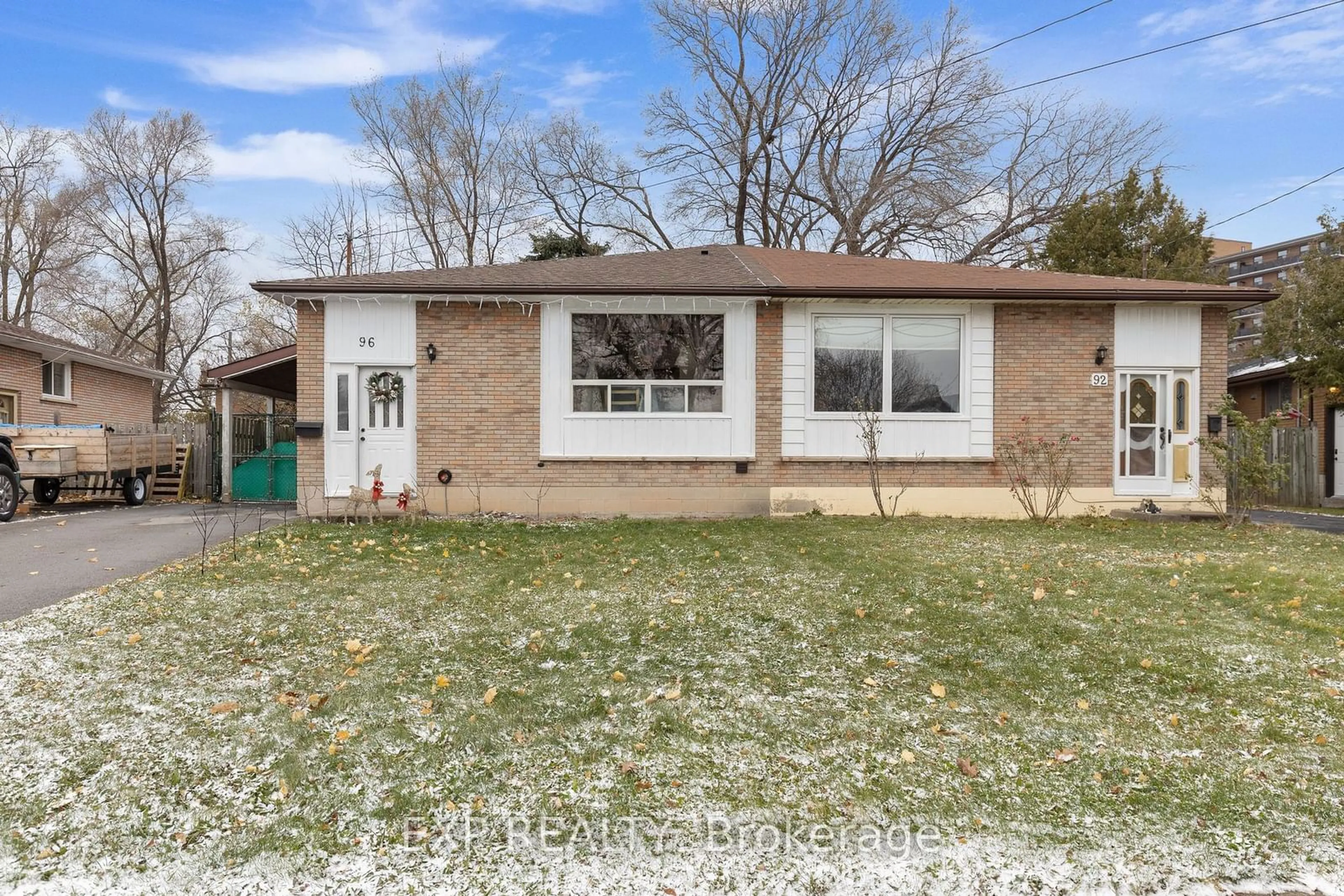 A pic from exterior of the house or condo, the fenced backyard for 96 Gainsborough Rd, Hamilton Ontario L8E 1E1