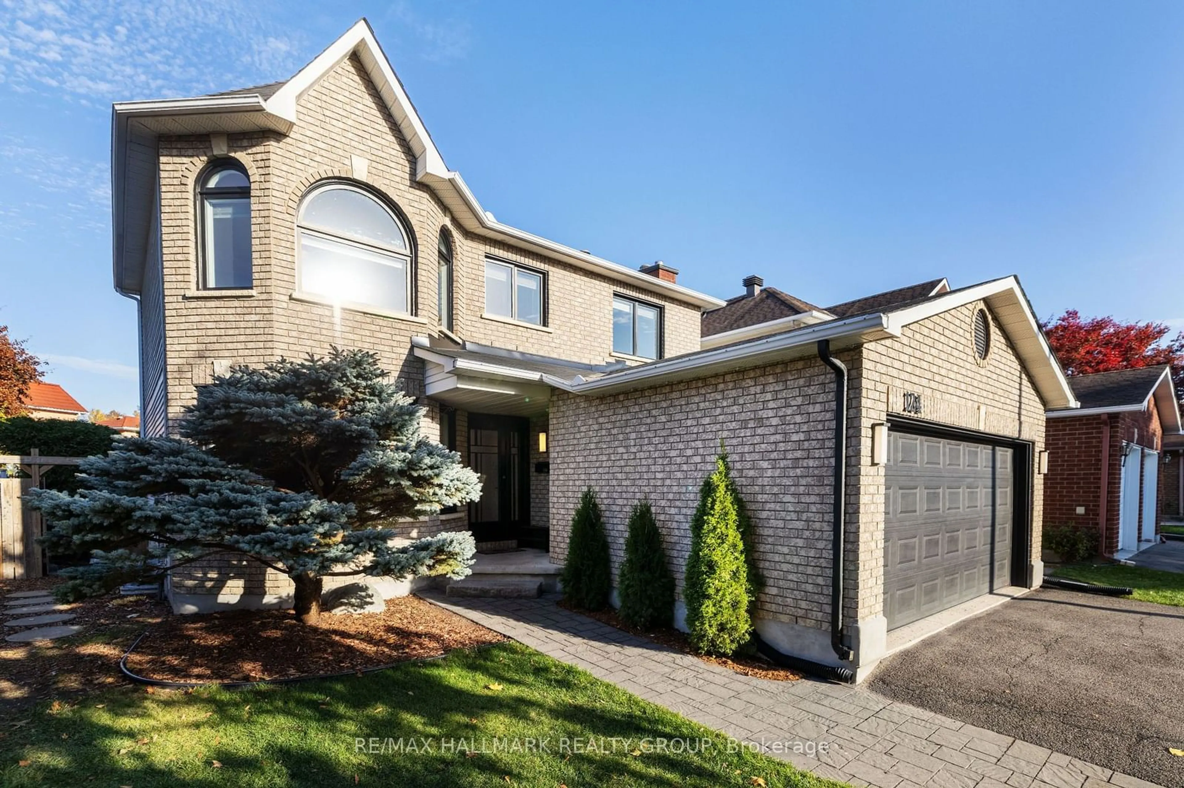 Home with brick exterior material for 124 Sai Cres, Hunt Club - South Keys and Area Ontario K1G 5P1