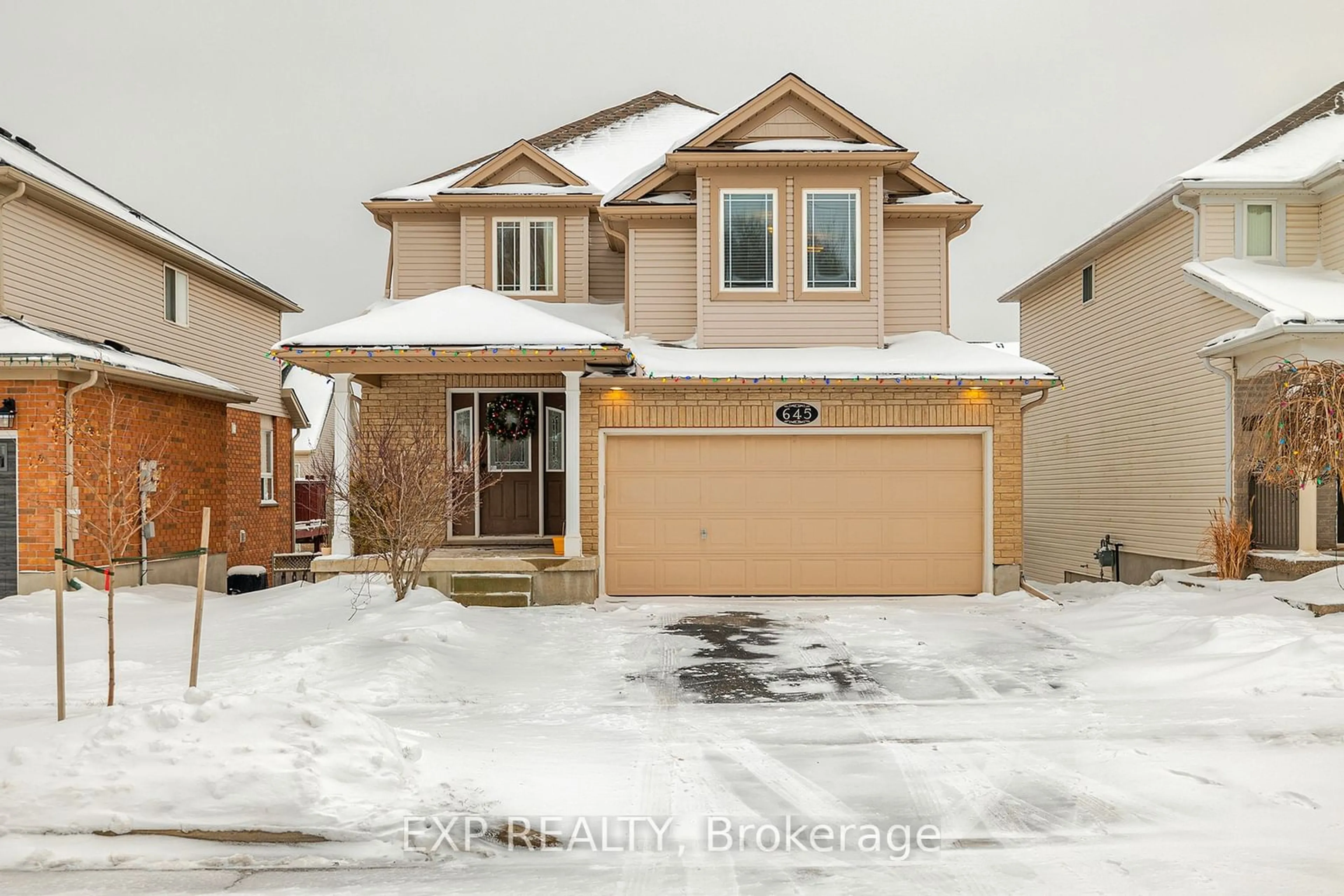 Frontside or backside of a home, the street view for 645 Interlaken Dr, Waterloo Ontario N2T 2Y5