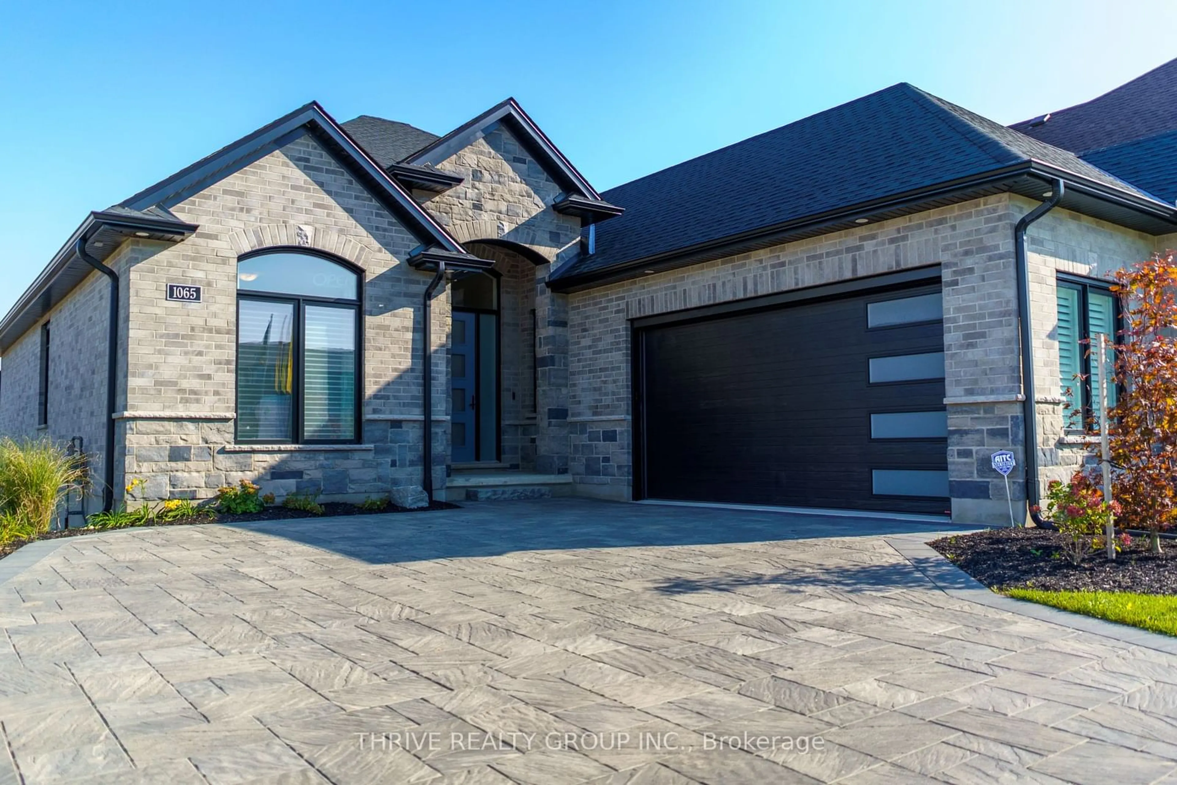 Home with brick exterior material for 1065 Meadowlark Rdge, London Ontario N6M 0H3