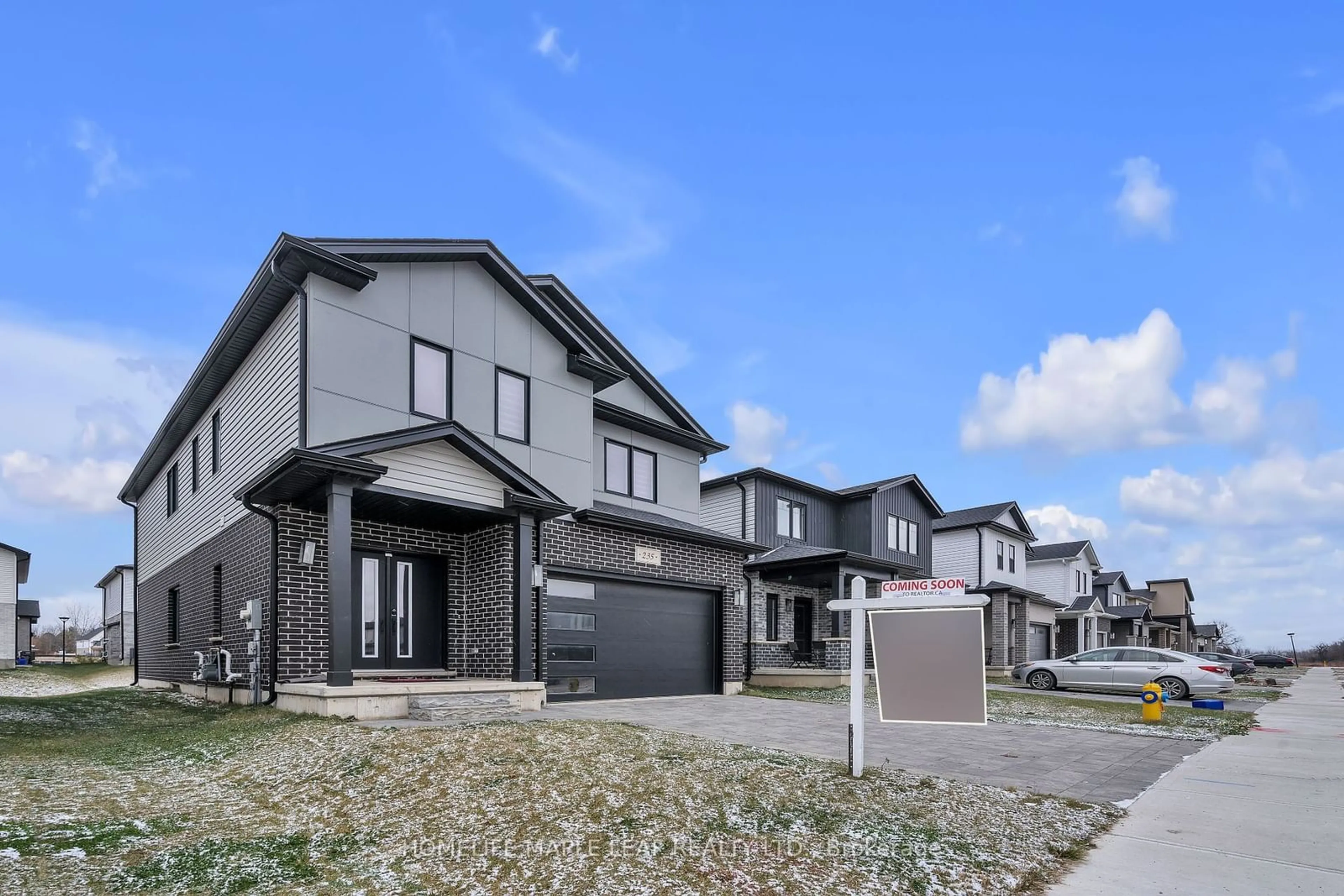 Frontside or backside of a home, the street view for 235 Byers St, London Ontario N6L 0J2