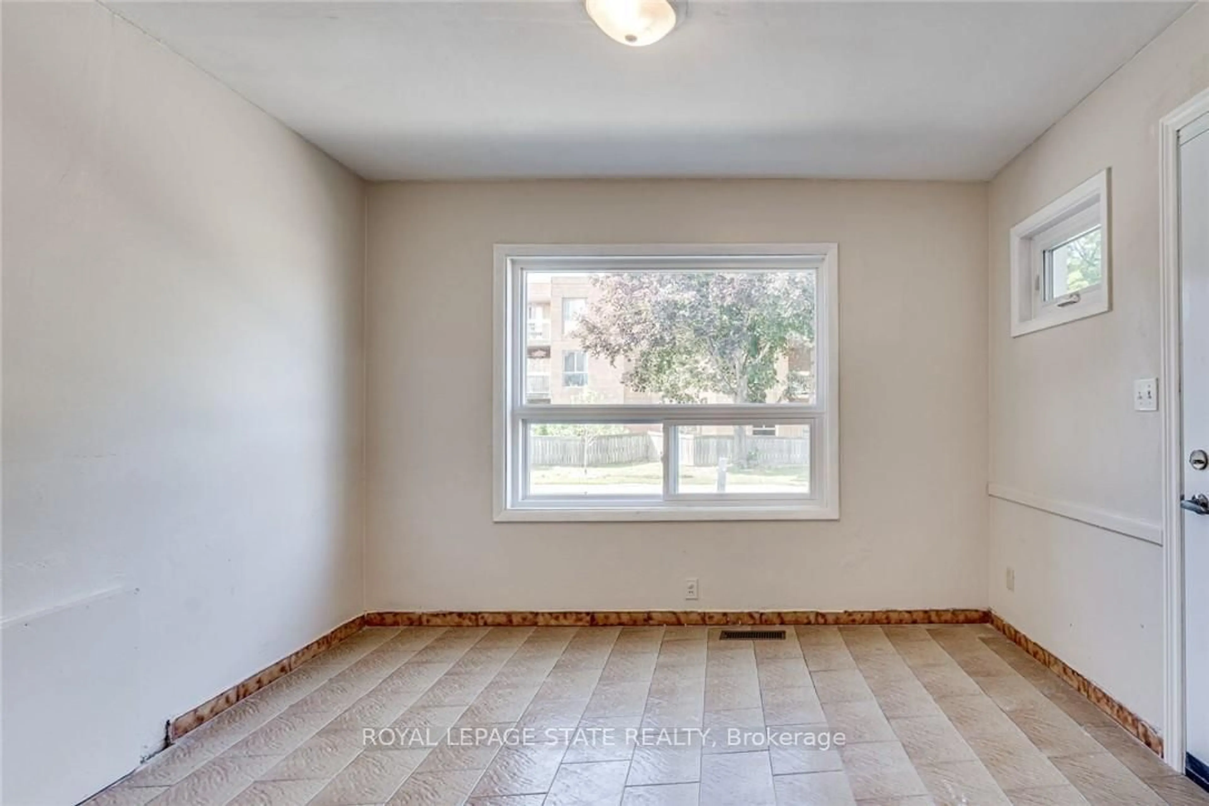 A pic of a room, wood floors for 94 Wentworth St, Hamilton Ontario L8L 5V4